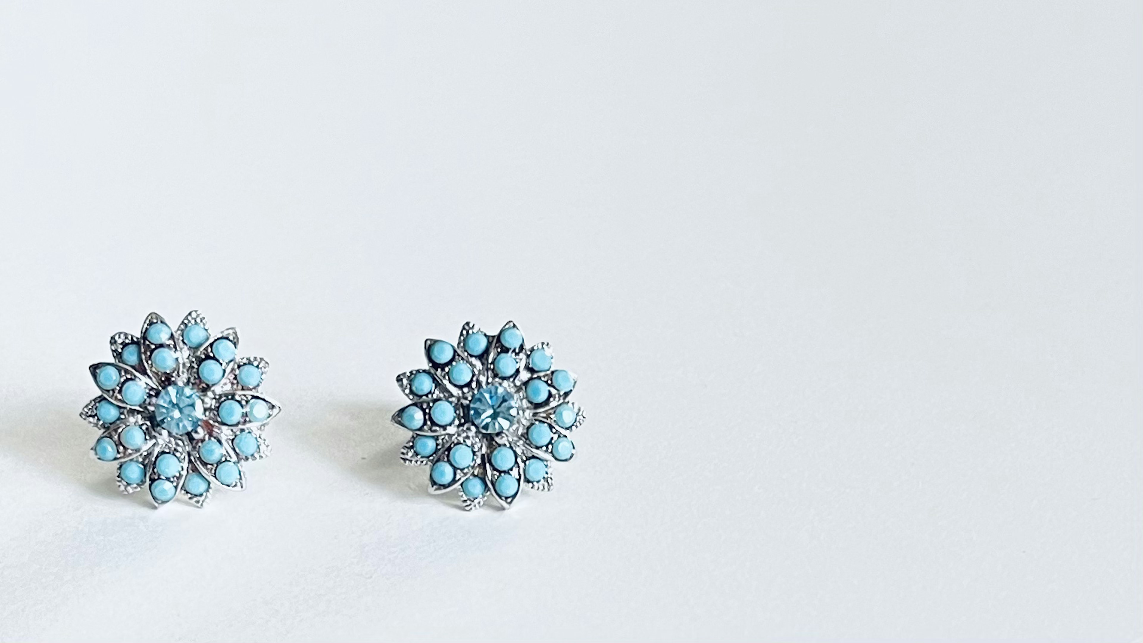 Beautiful earrings adorned with blue gemstones