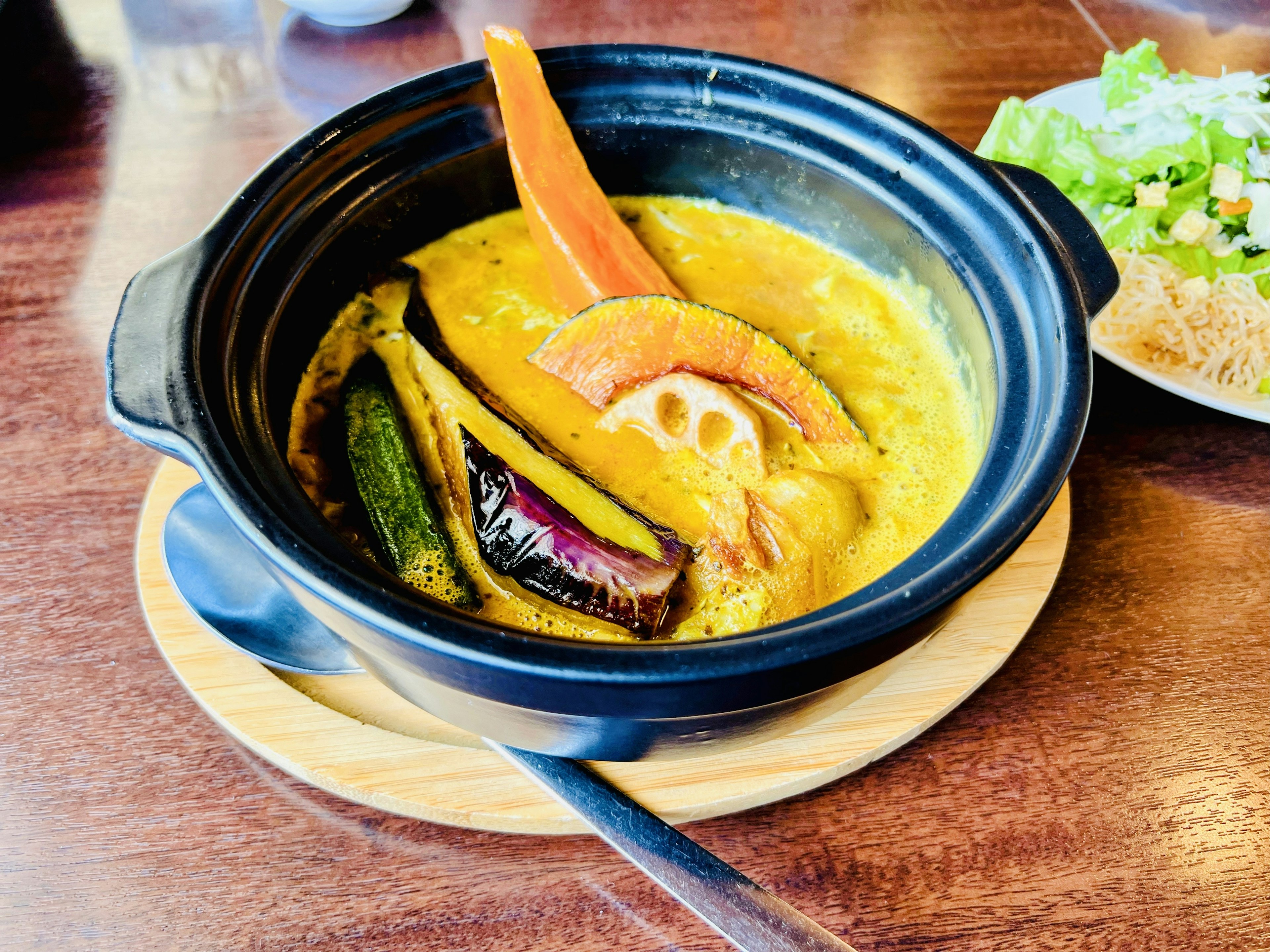 Creamy curry pot dish with colorful vegetables