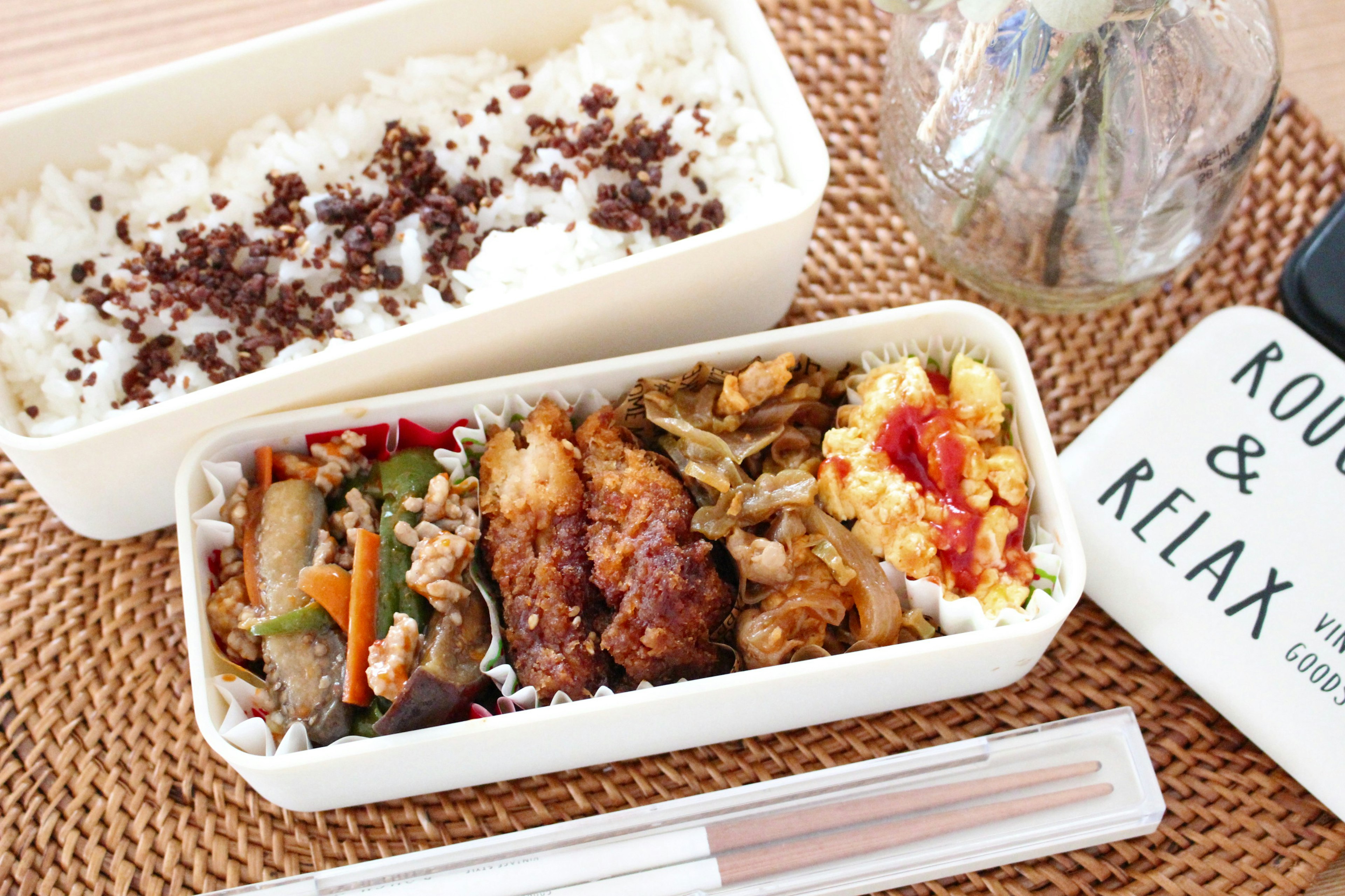 A bento box filled with delicious dishes and white rice