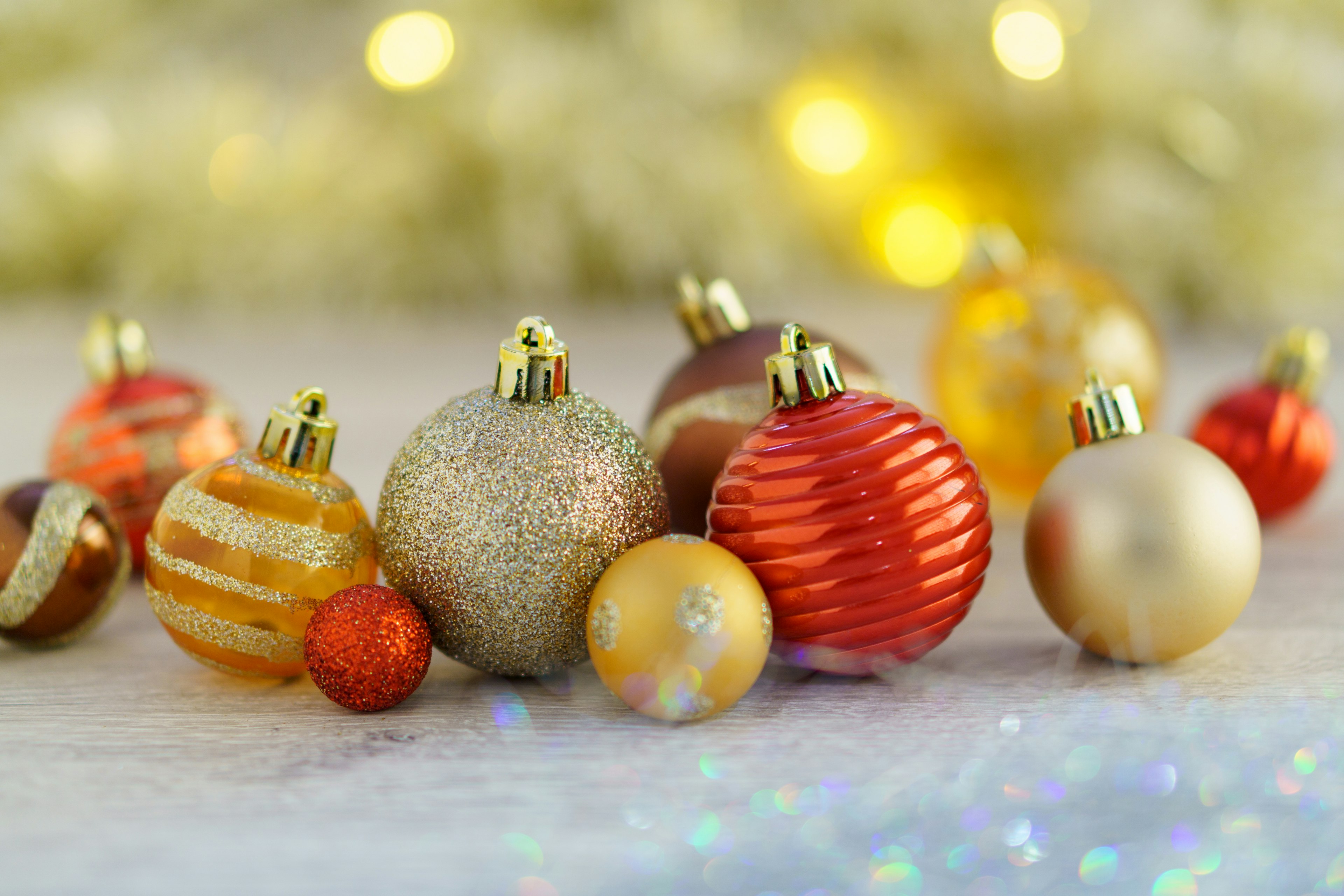 Colorful Christmas ornaments arranged on a surface