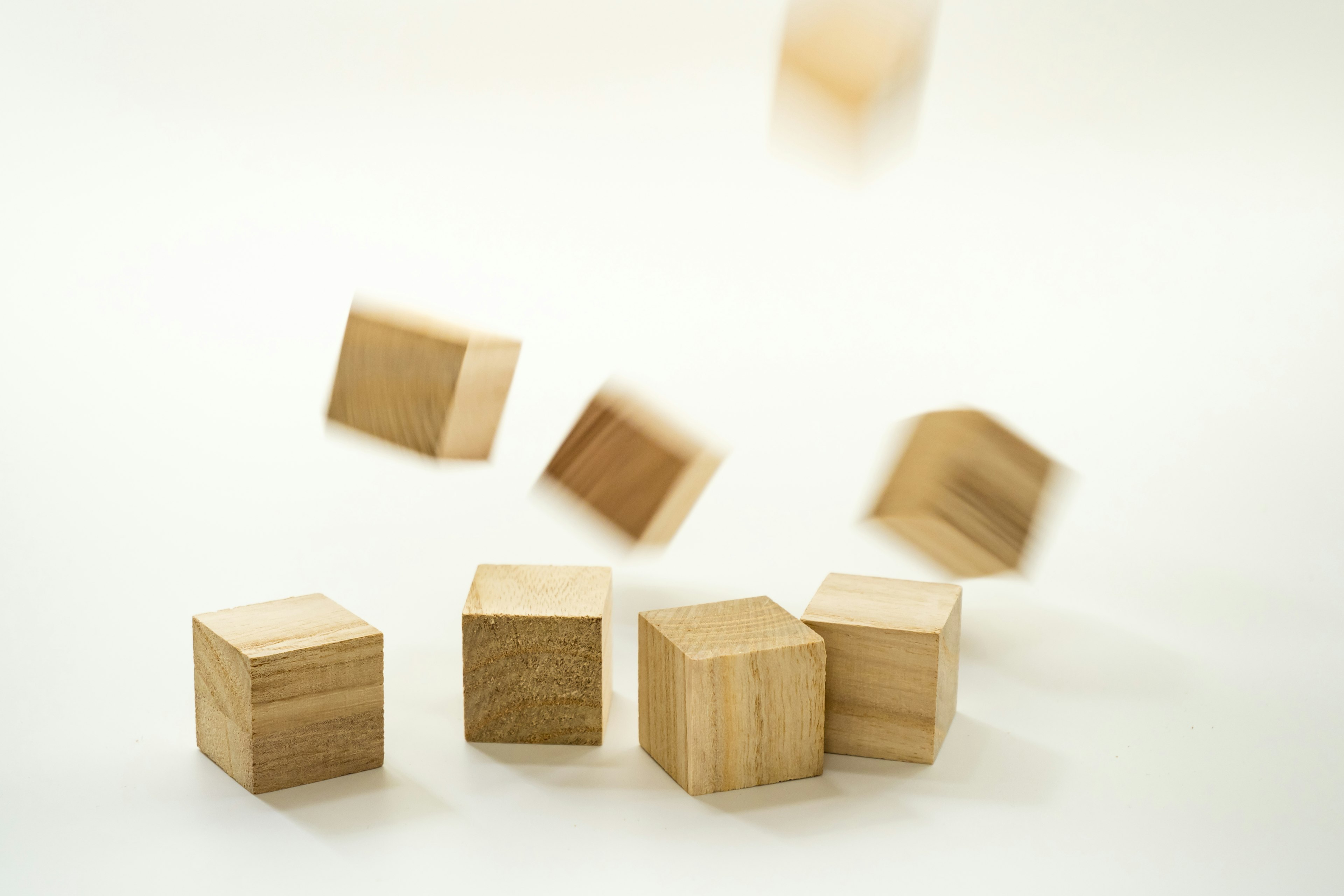 Wooden cubes floating in mid-air