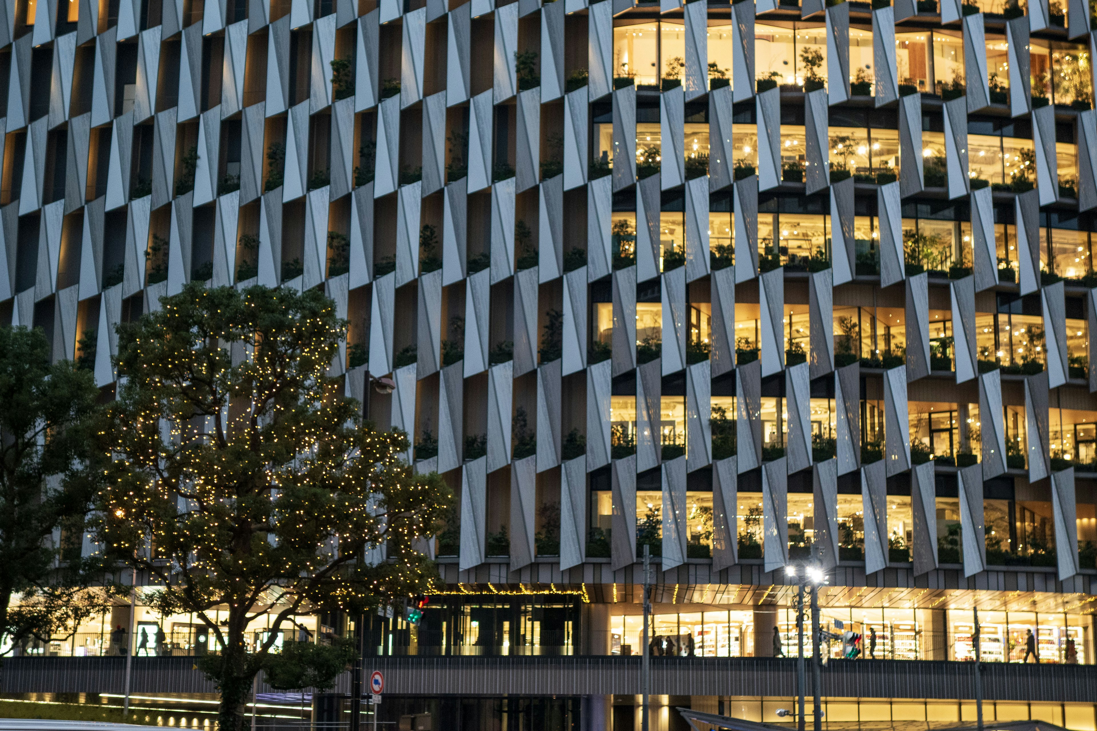 Modern building facade with illuminated windows