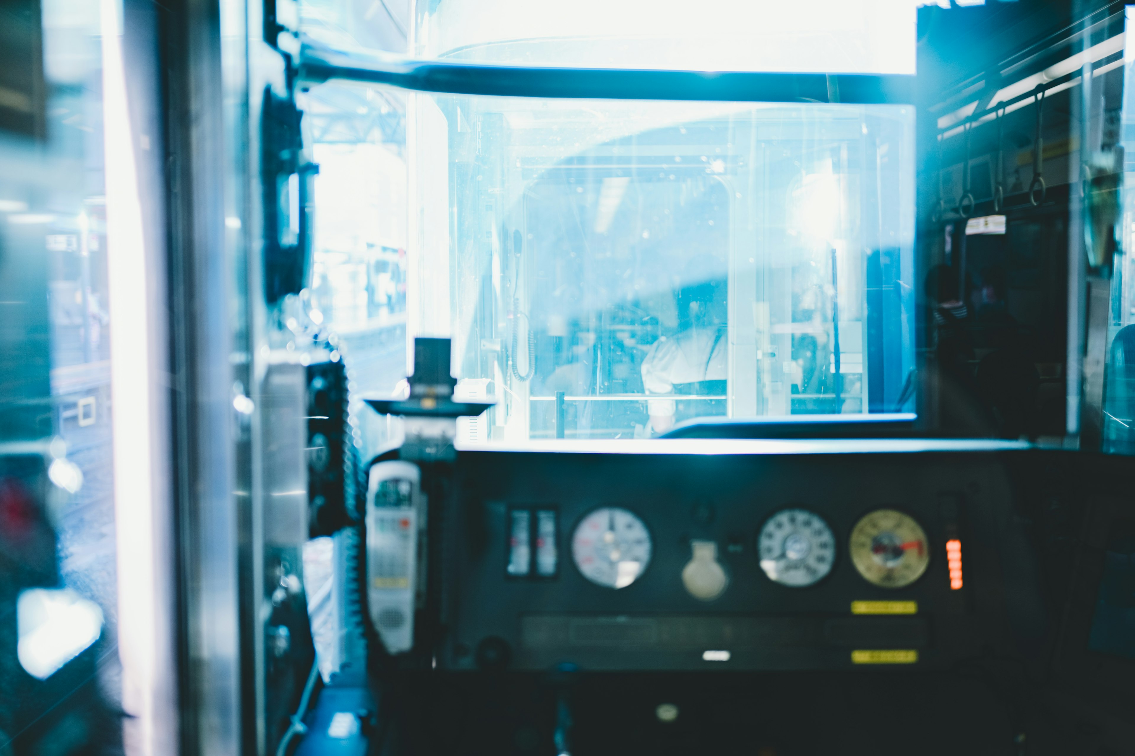 View of bus driver's dashboard with gauges and controls