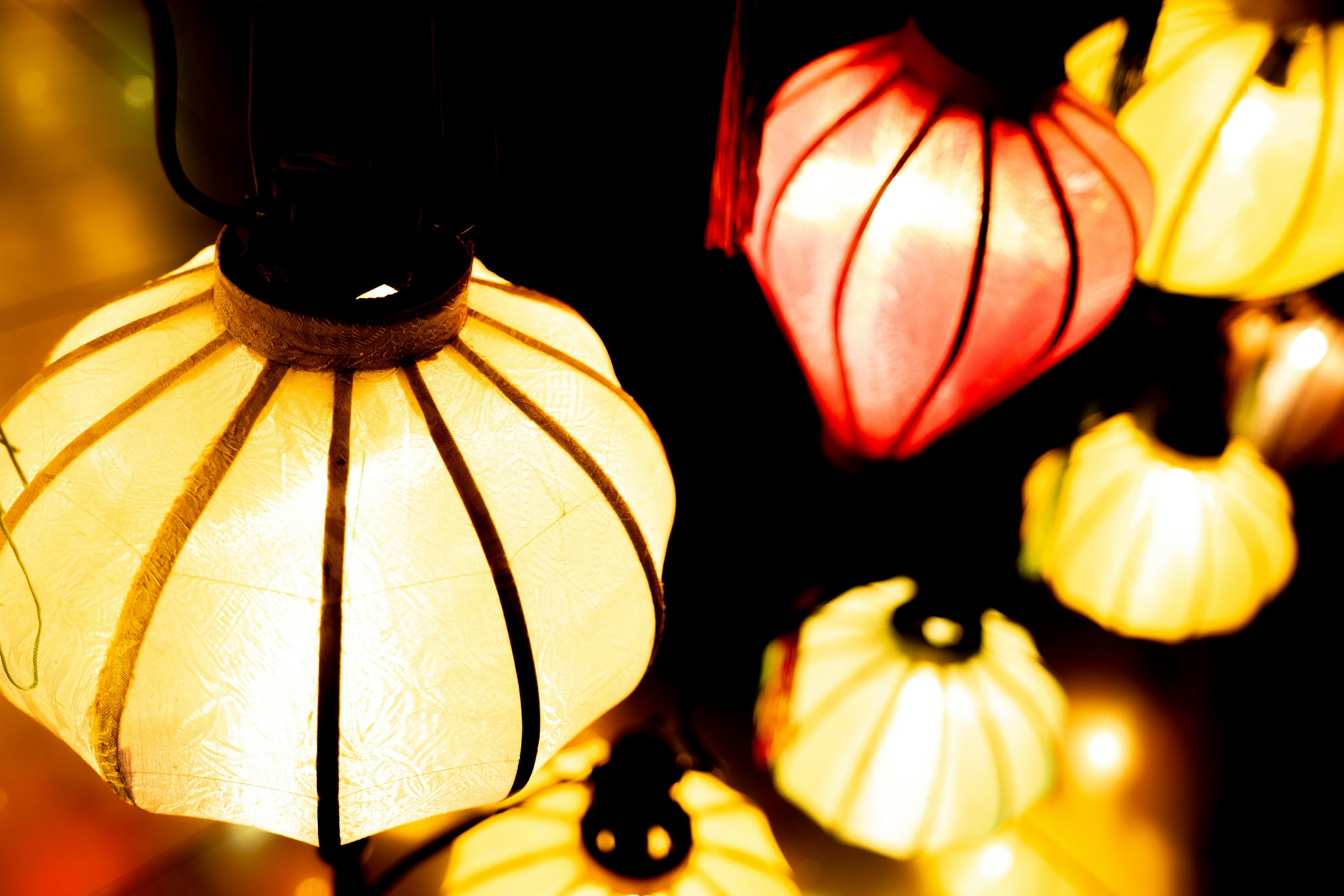 Colorful lanterns hanging in a decorative arrangement