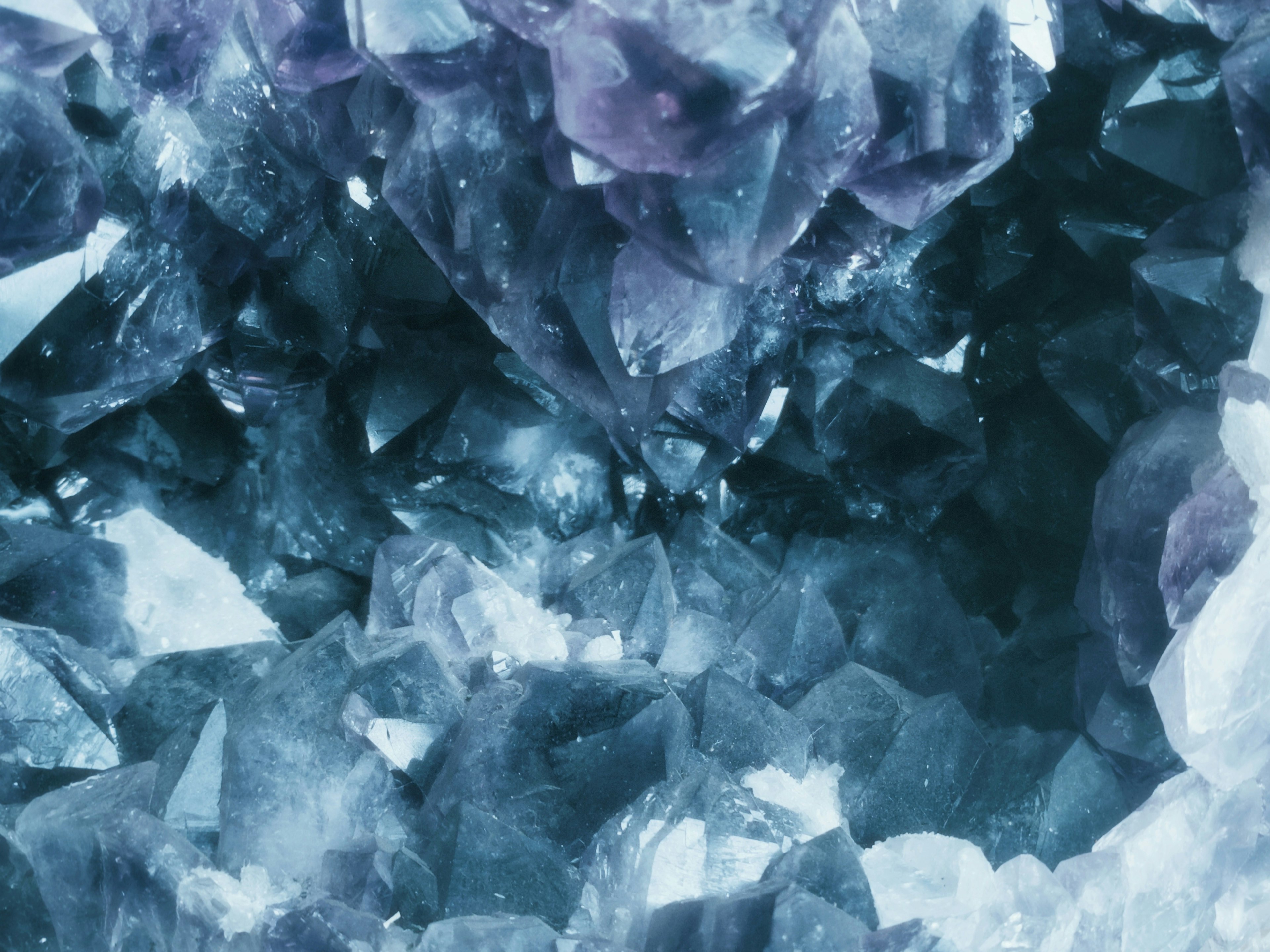 Close-up of beautiful blue and purple crystals in a mineral formation