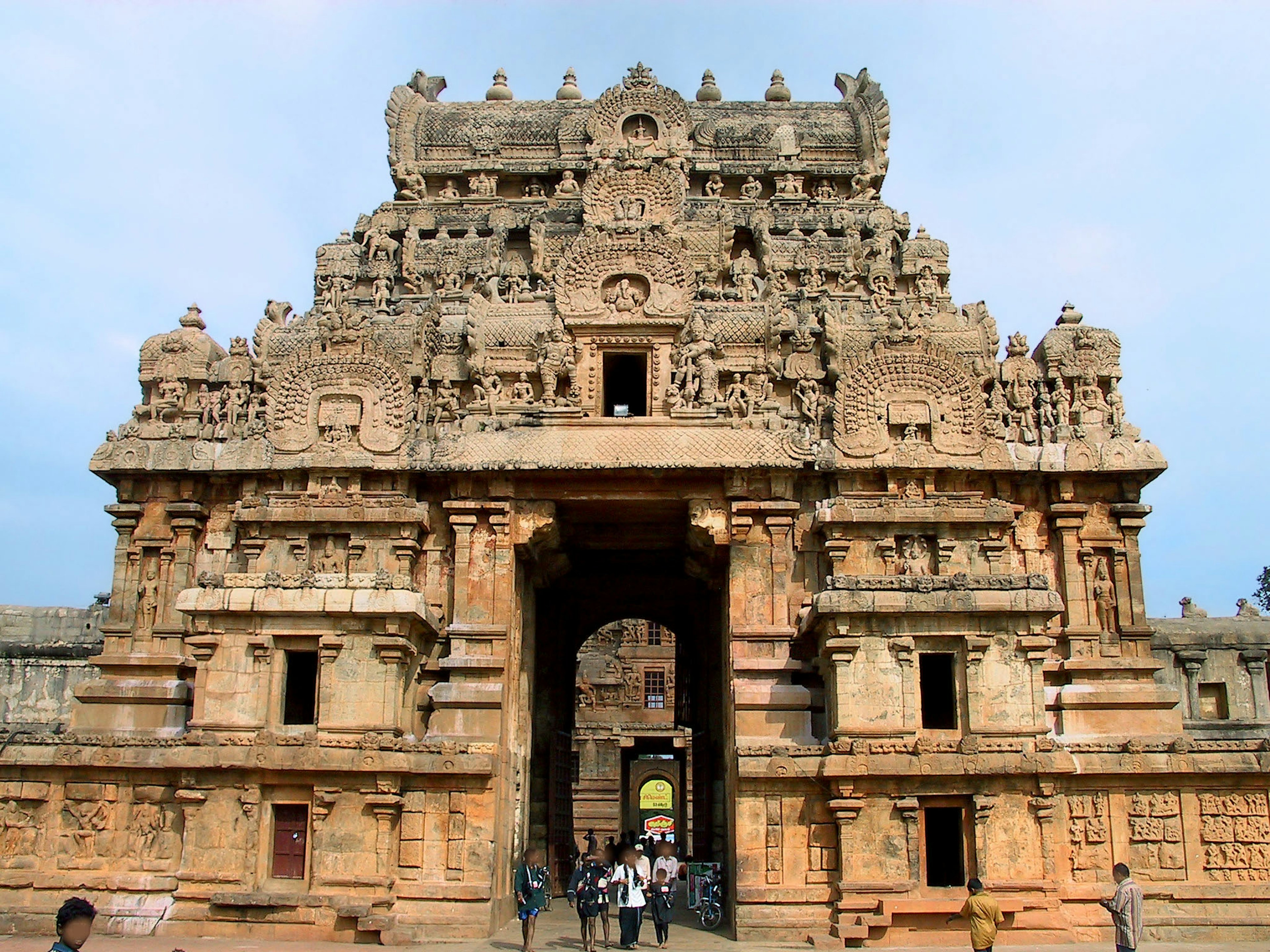 Grand entrance of an ancient temple with intricate carvings