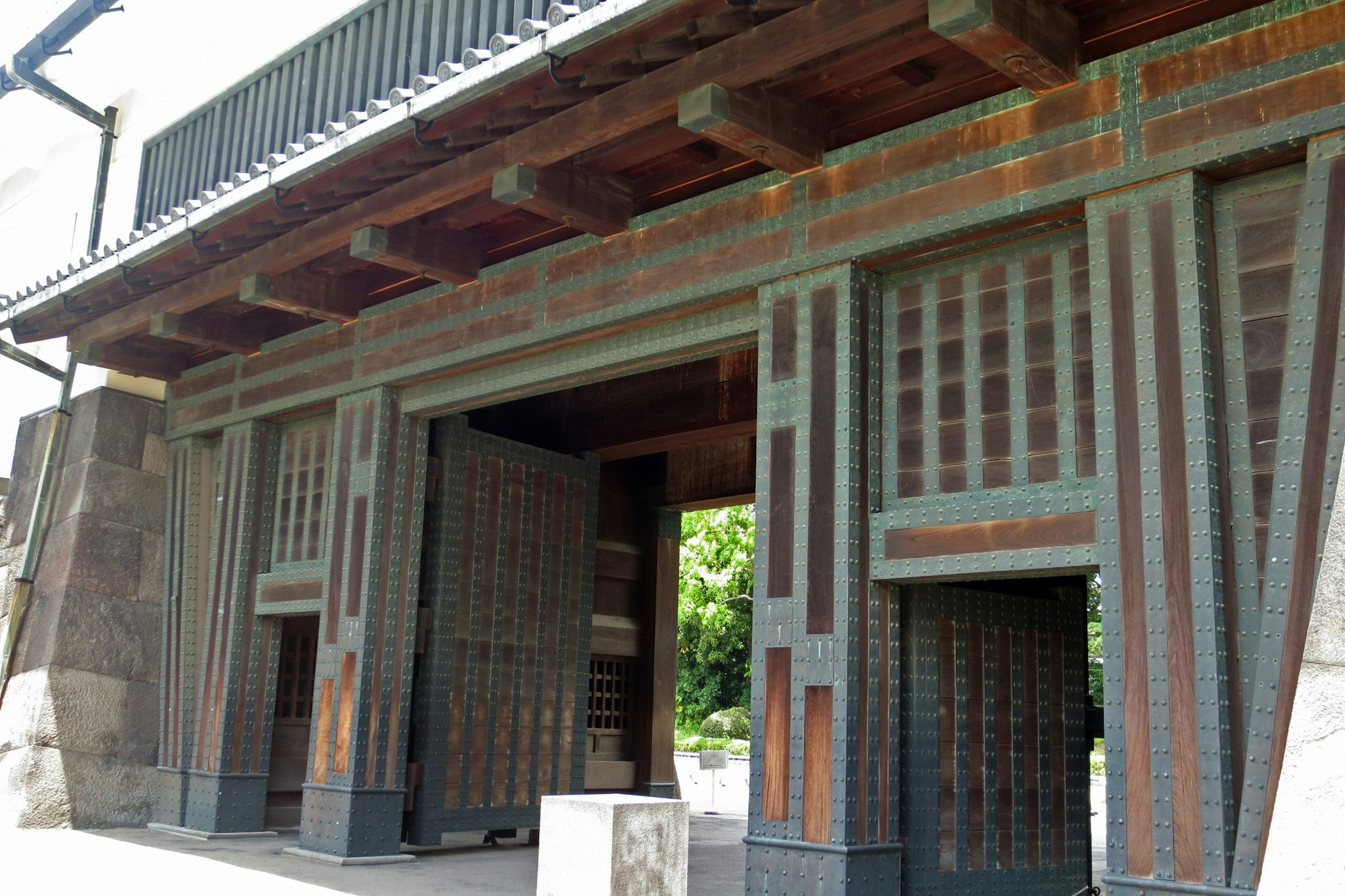 Traditional Japanese gate structure and design visible