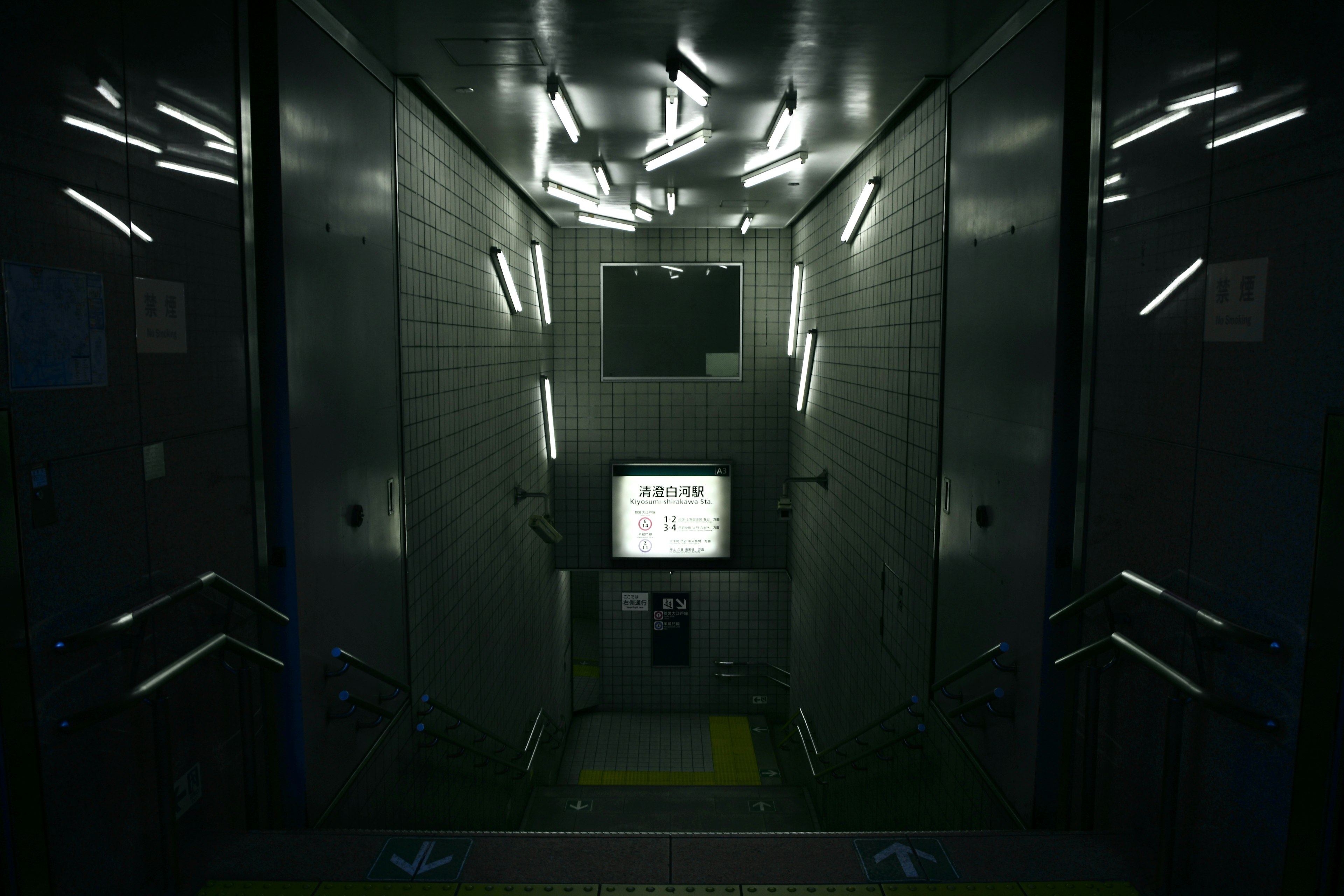 Interior of a dark elevator featuring unique lighting