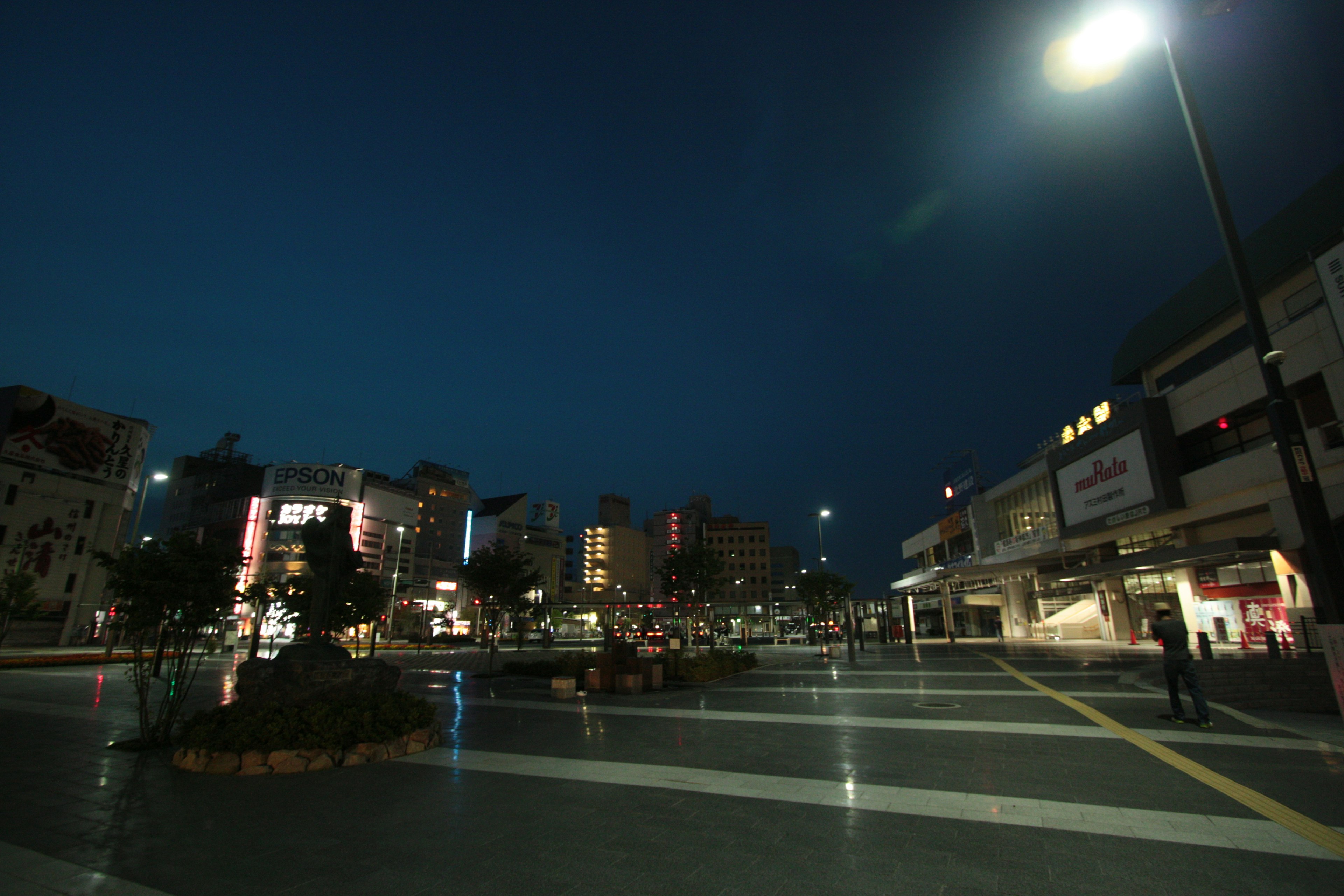 Night cityscape with illuminated buildings and quiet atmosphere