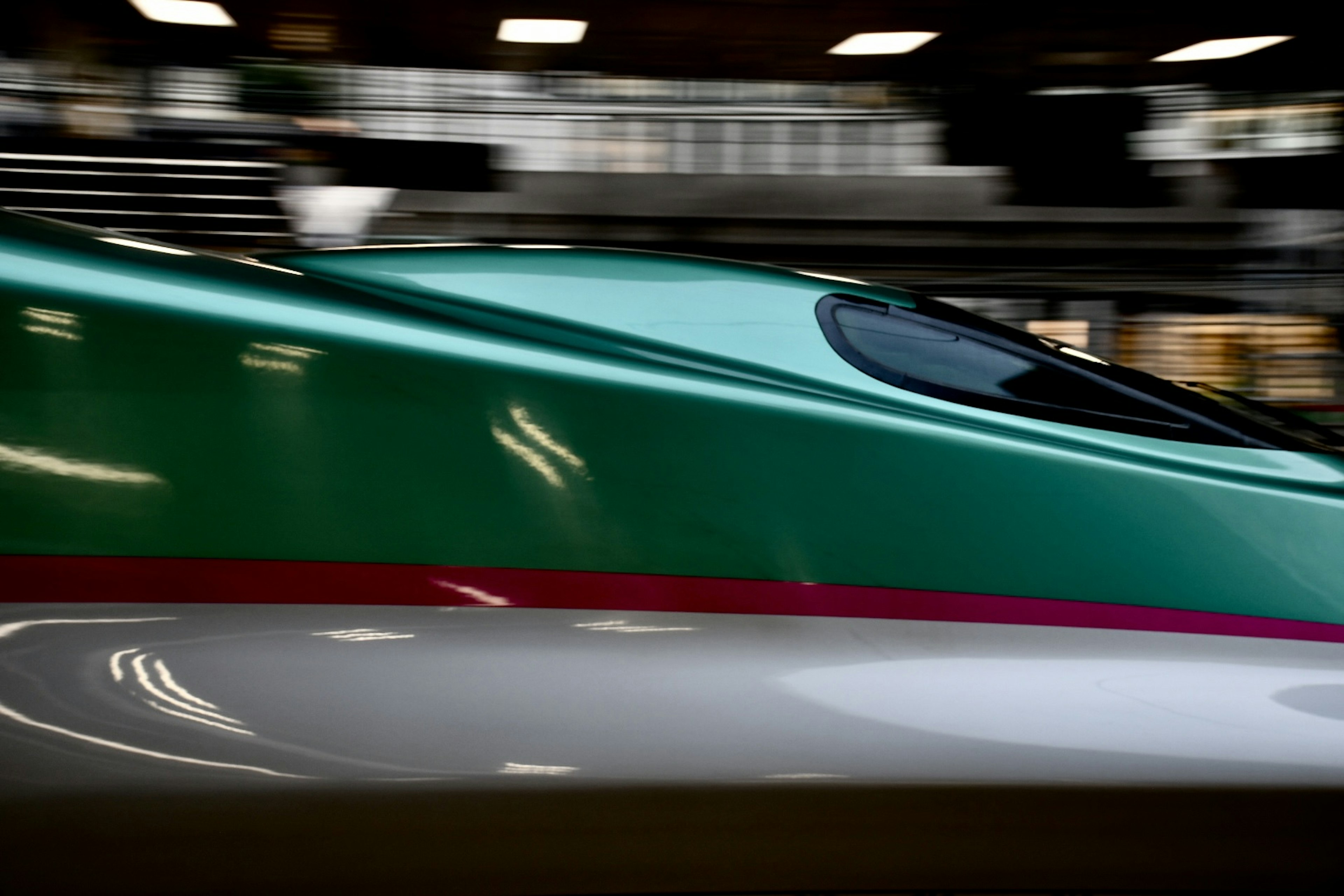 Close-up of a Shinkansen train's streamlined design