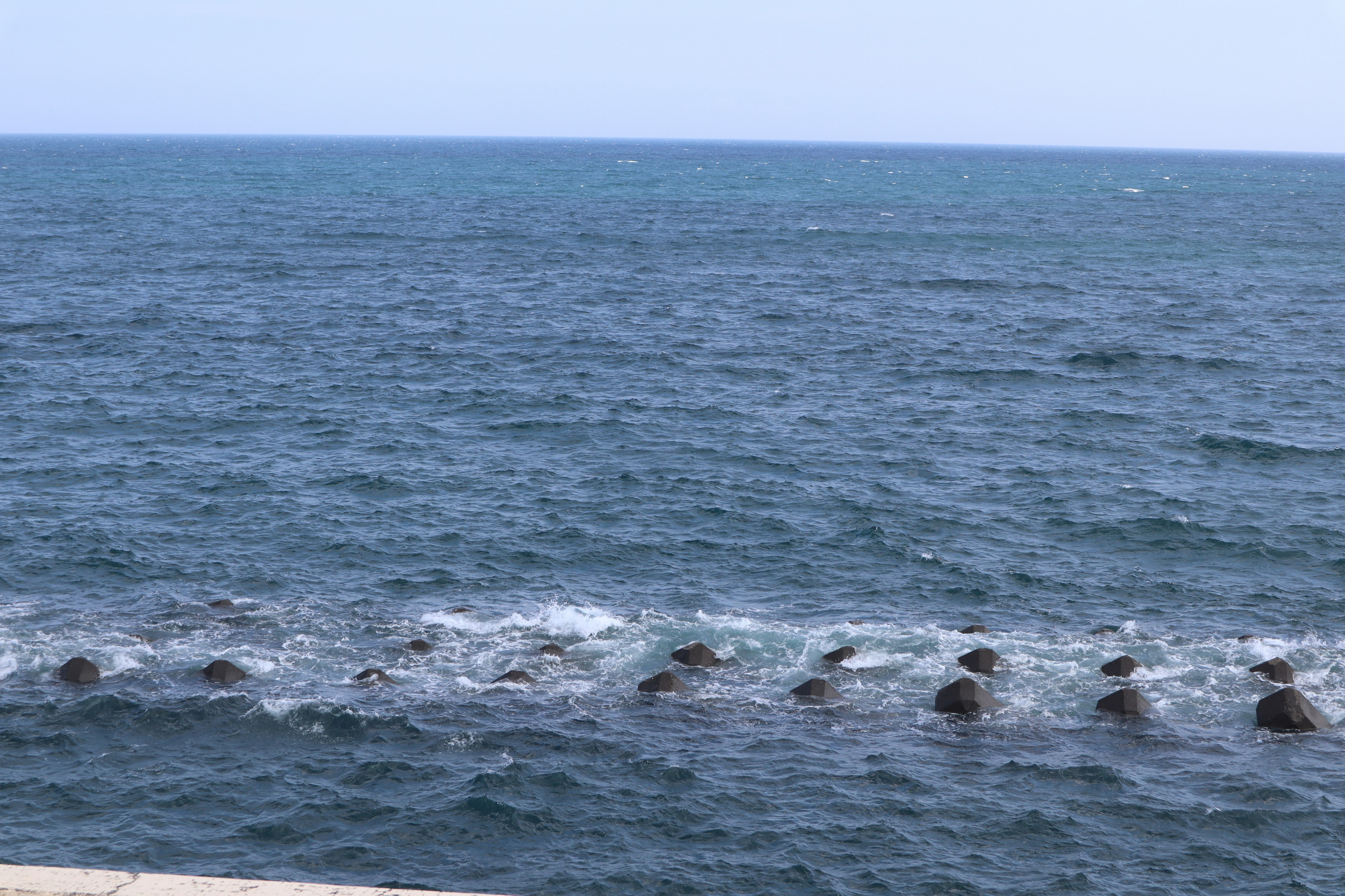 Rocky shoreline with waves crashing