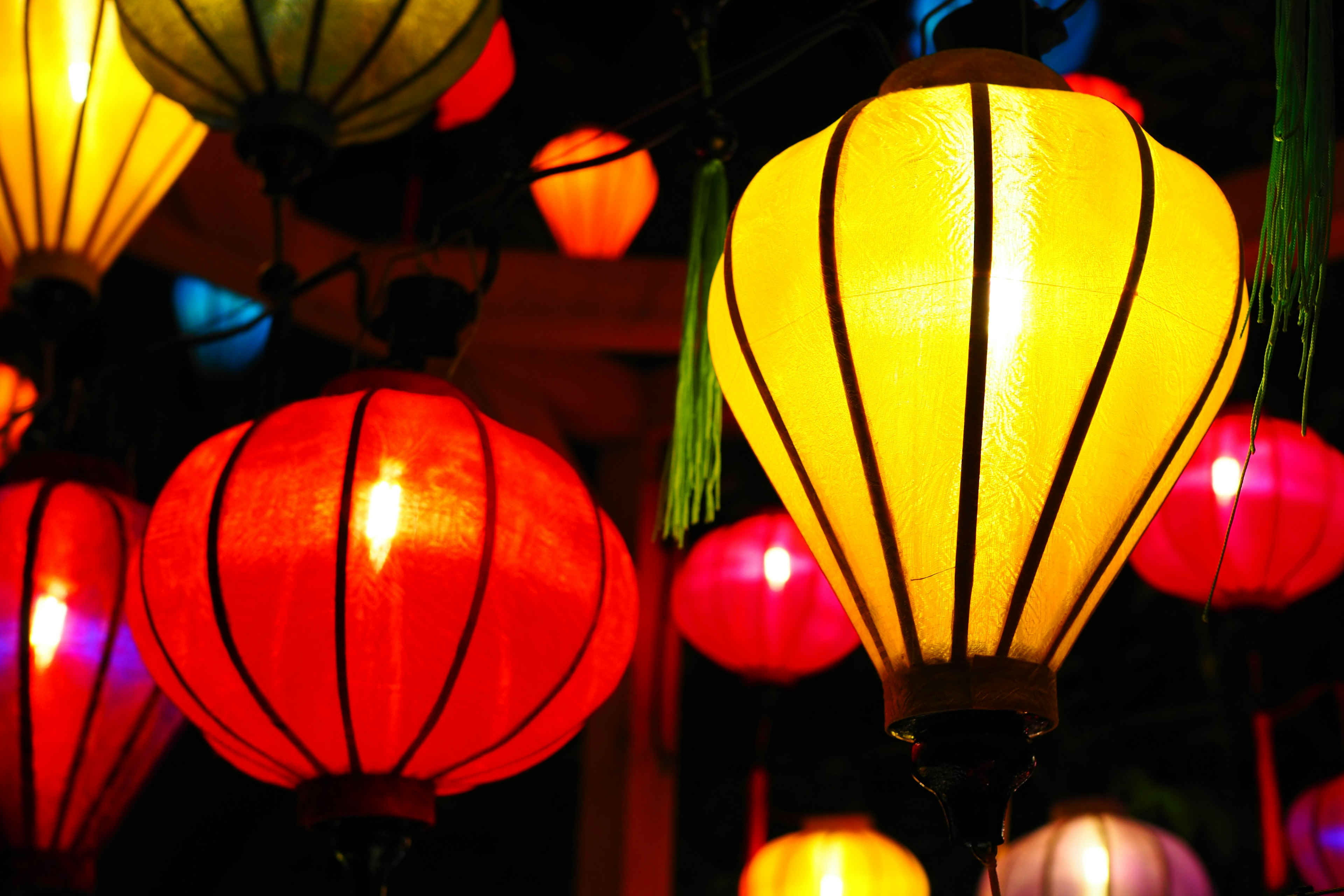 Colorful lanterns hanging in a night scene