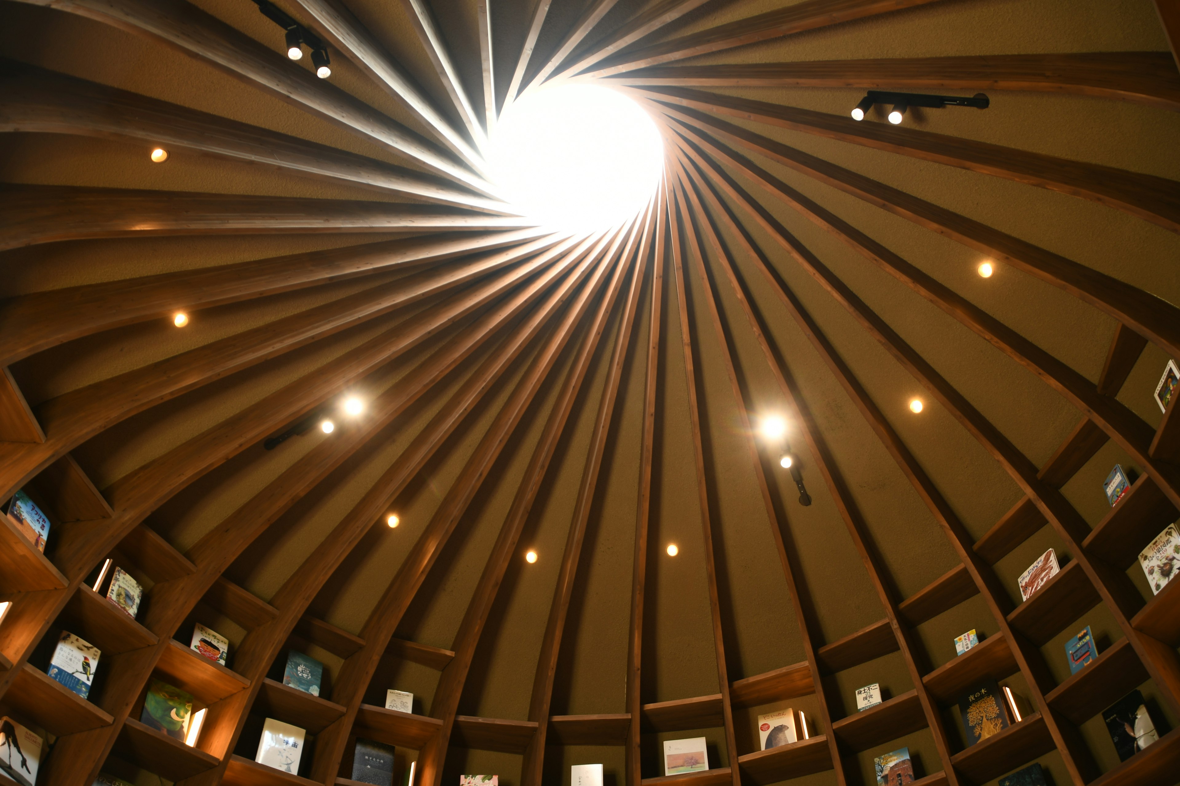 Image showing a circular ceiling viewed from below Light radiates from the center