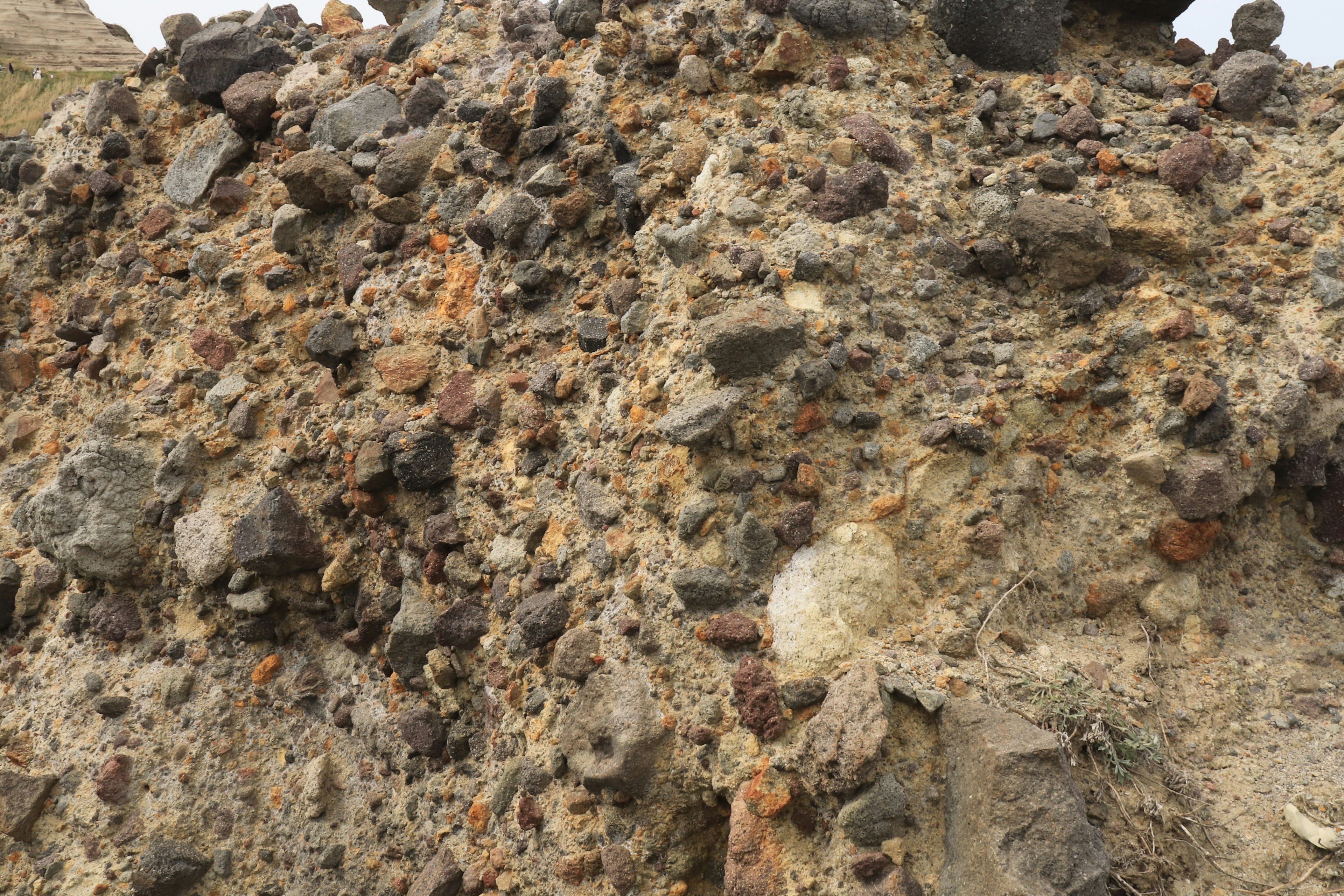 Close-up of a pile of mixed rocks and soil