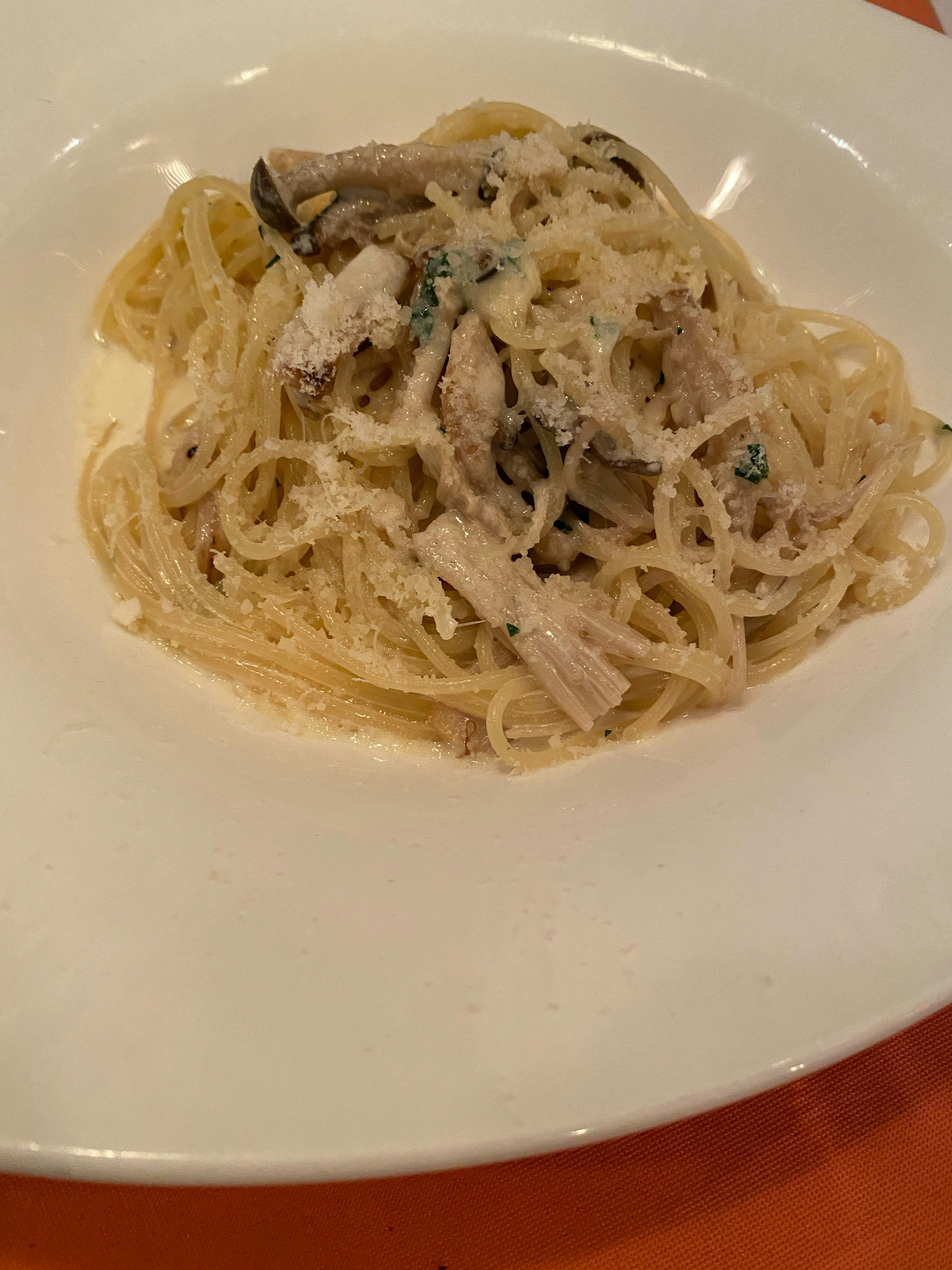 Creamy pasta topped with mushrooms