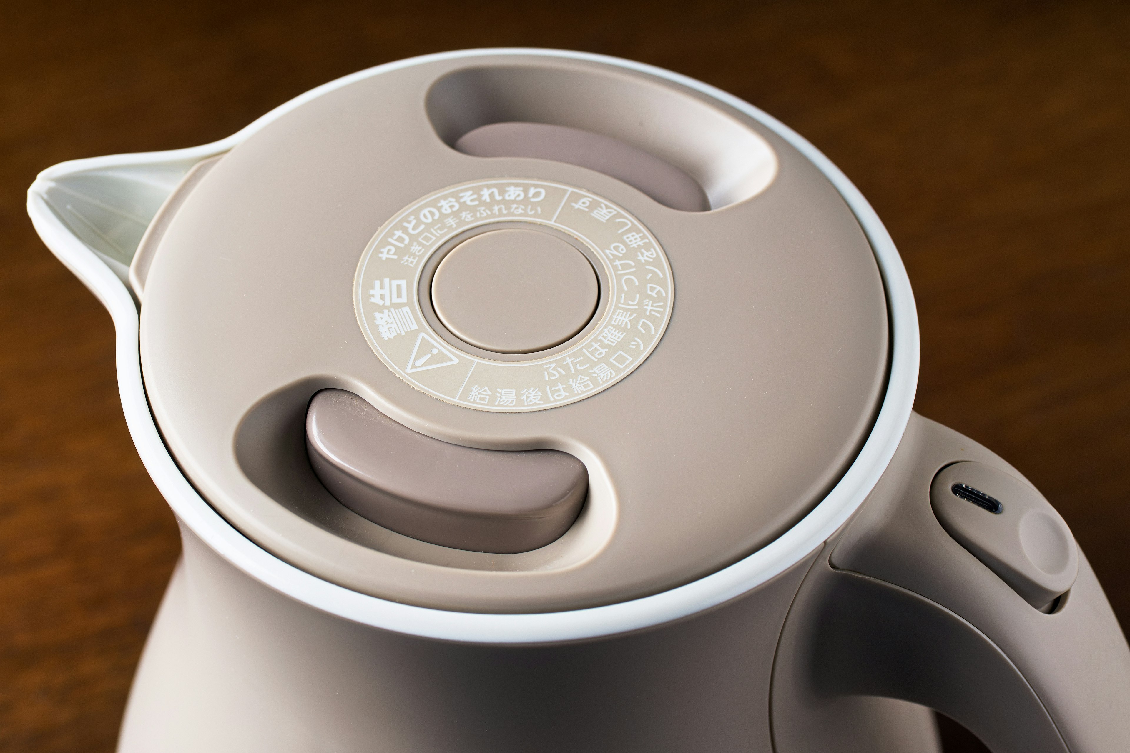 Top view of a sleek electric kettle with a minimalist design