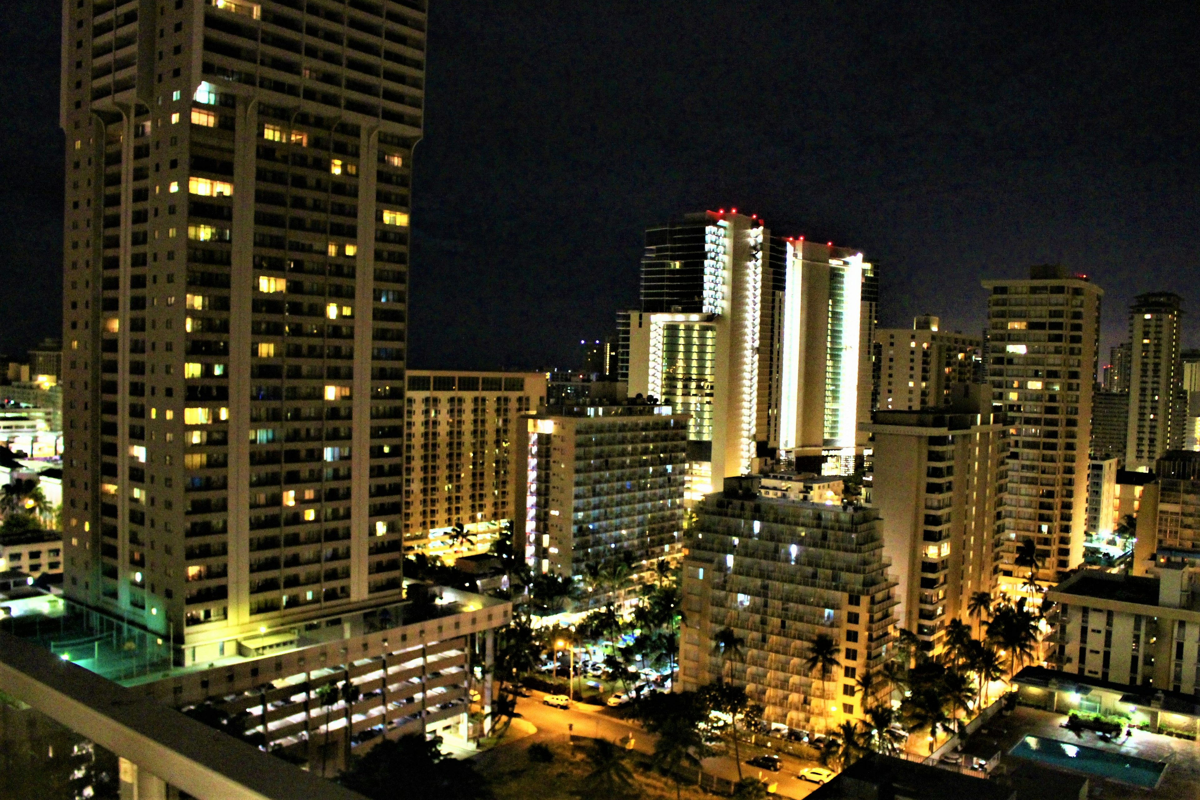 Night cityscape with illuminated skyscrapers showcasing Manila's skyline