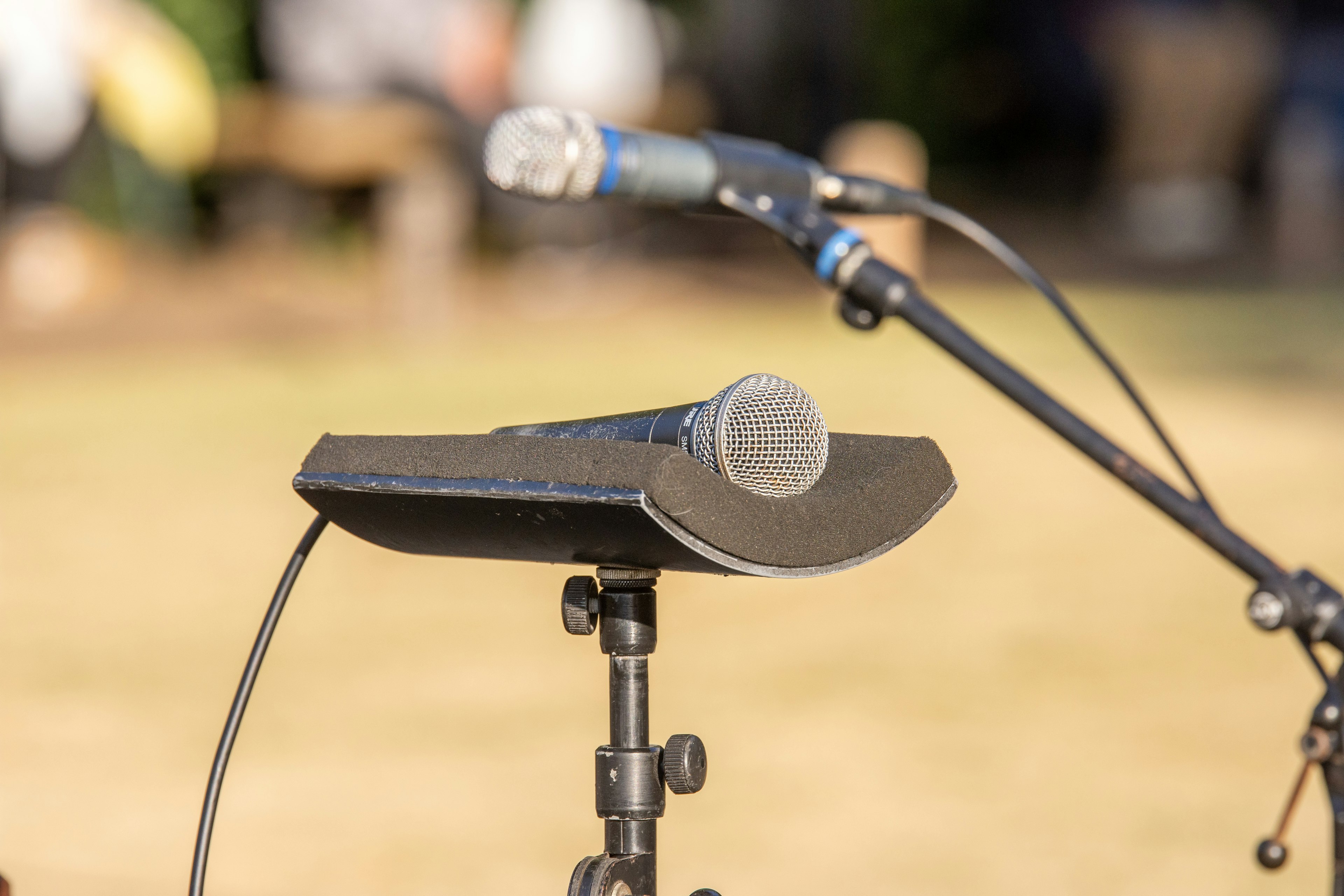 Microphone setup with a stand and a handheld microphone