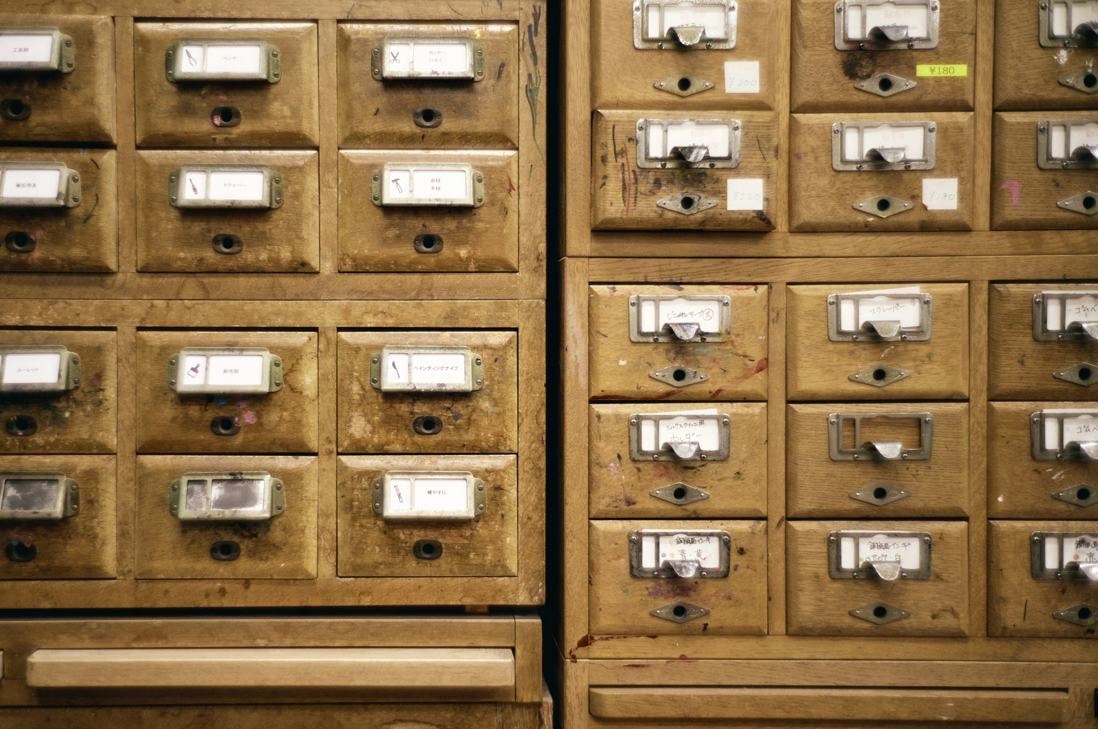 Wooden card catalog drawers arranged in a grid