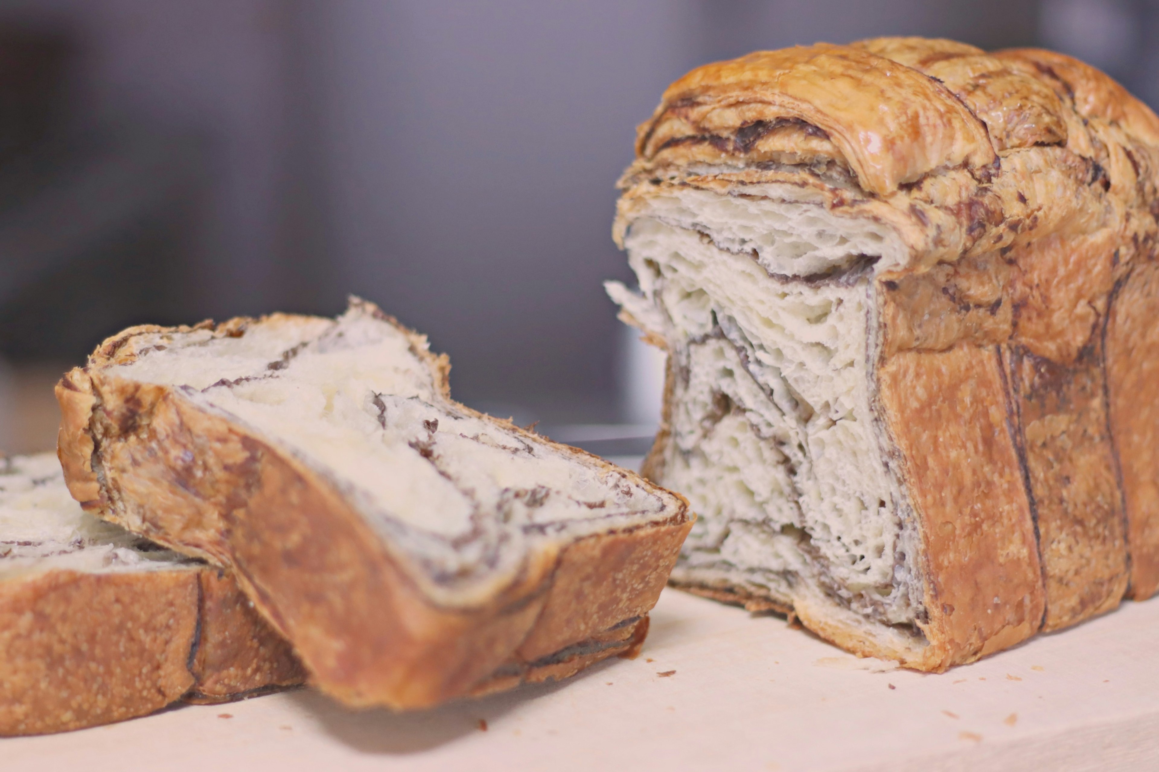 Sliced loaf of bread with visible texture and swirls