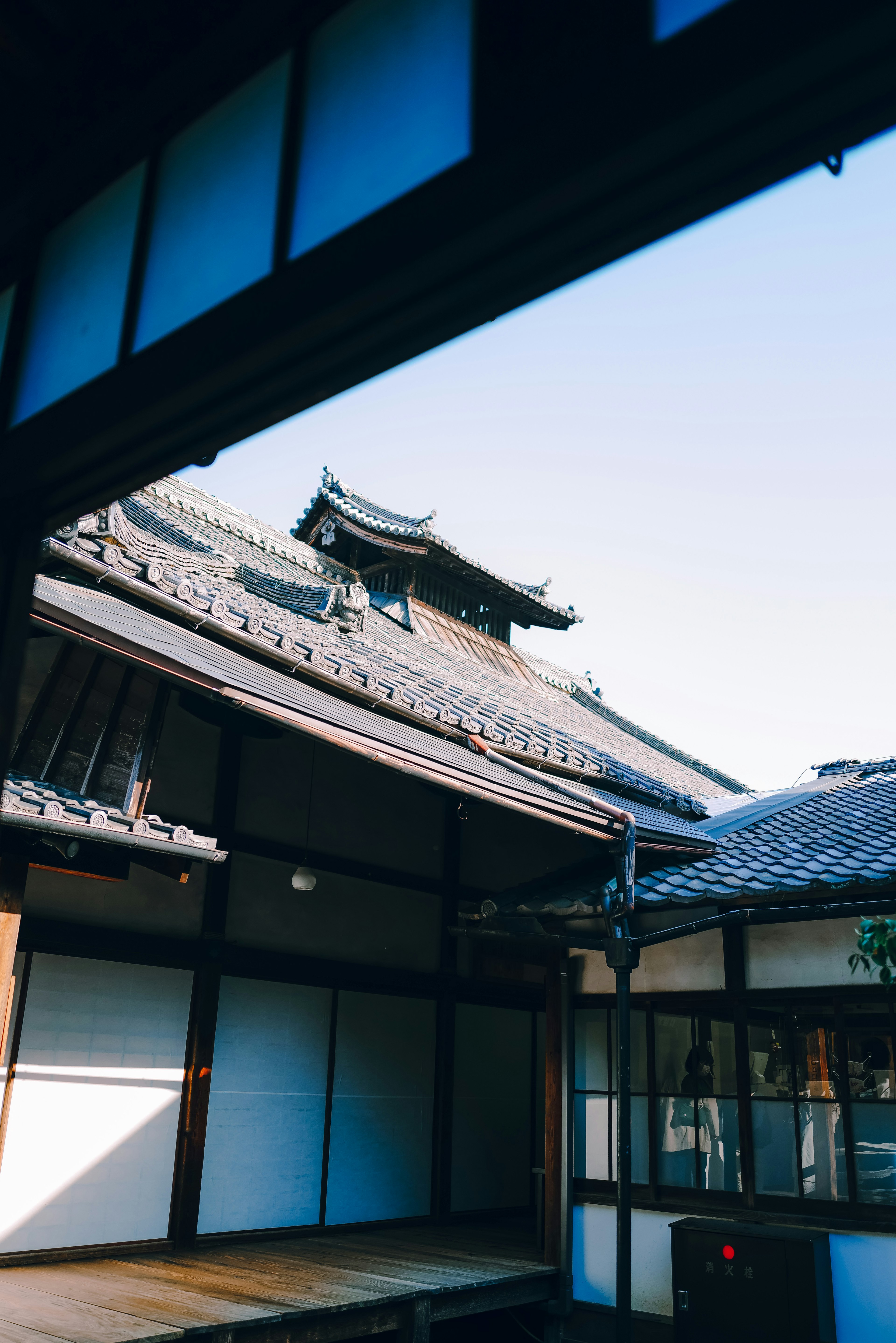 Traditional Japanese architecture with a clear blue sky in the background