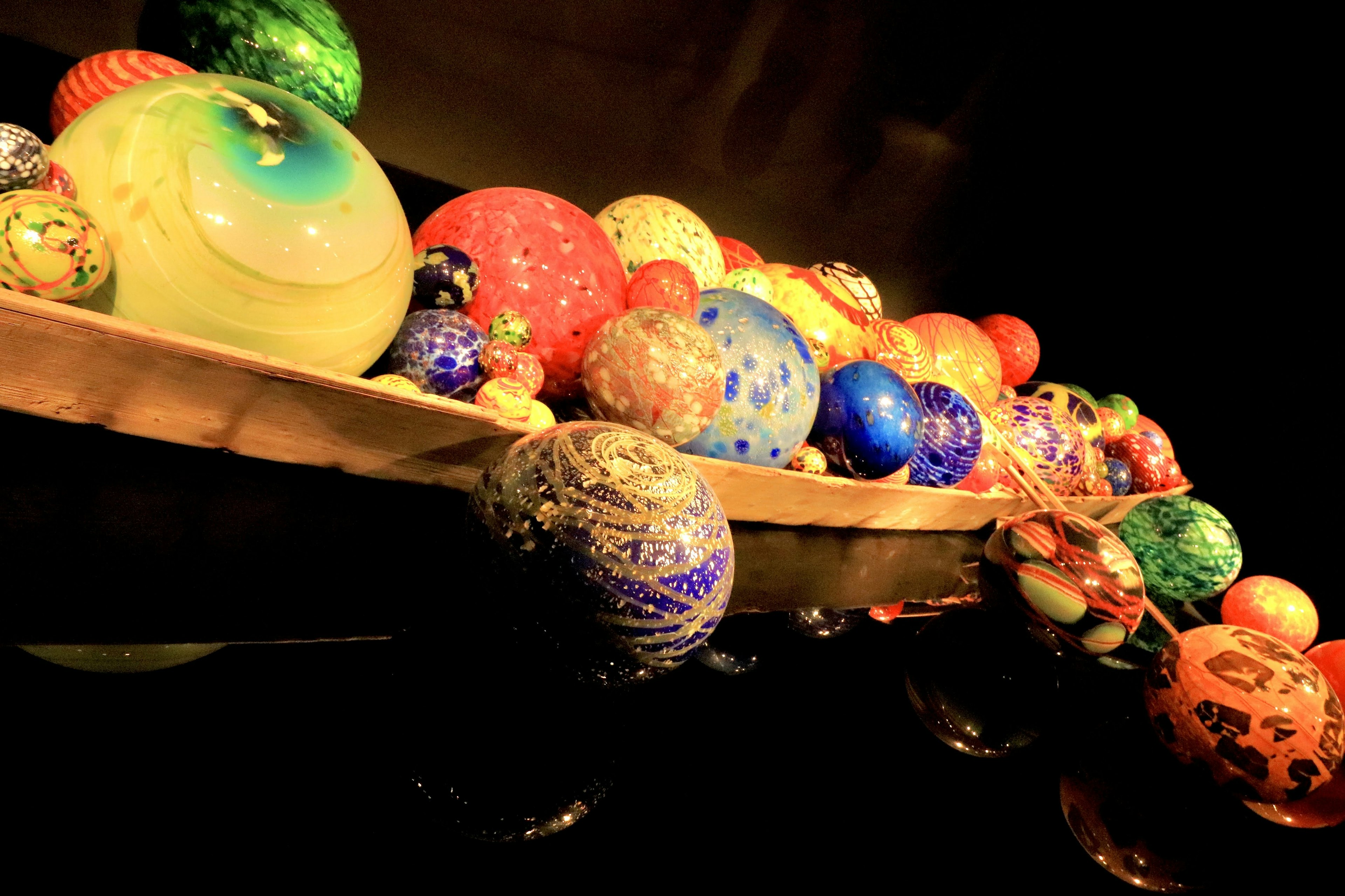 Colorful glass orbs arranged in an elegant display