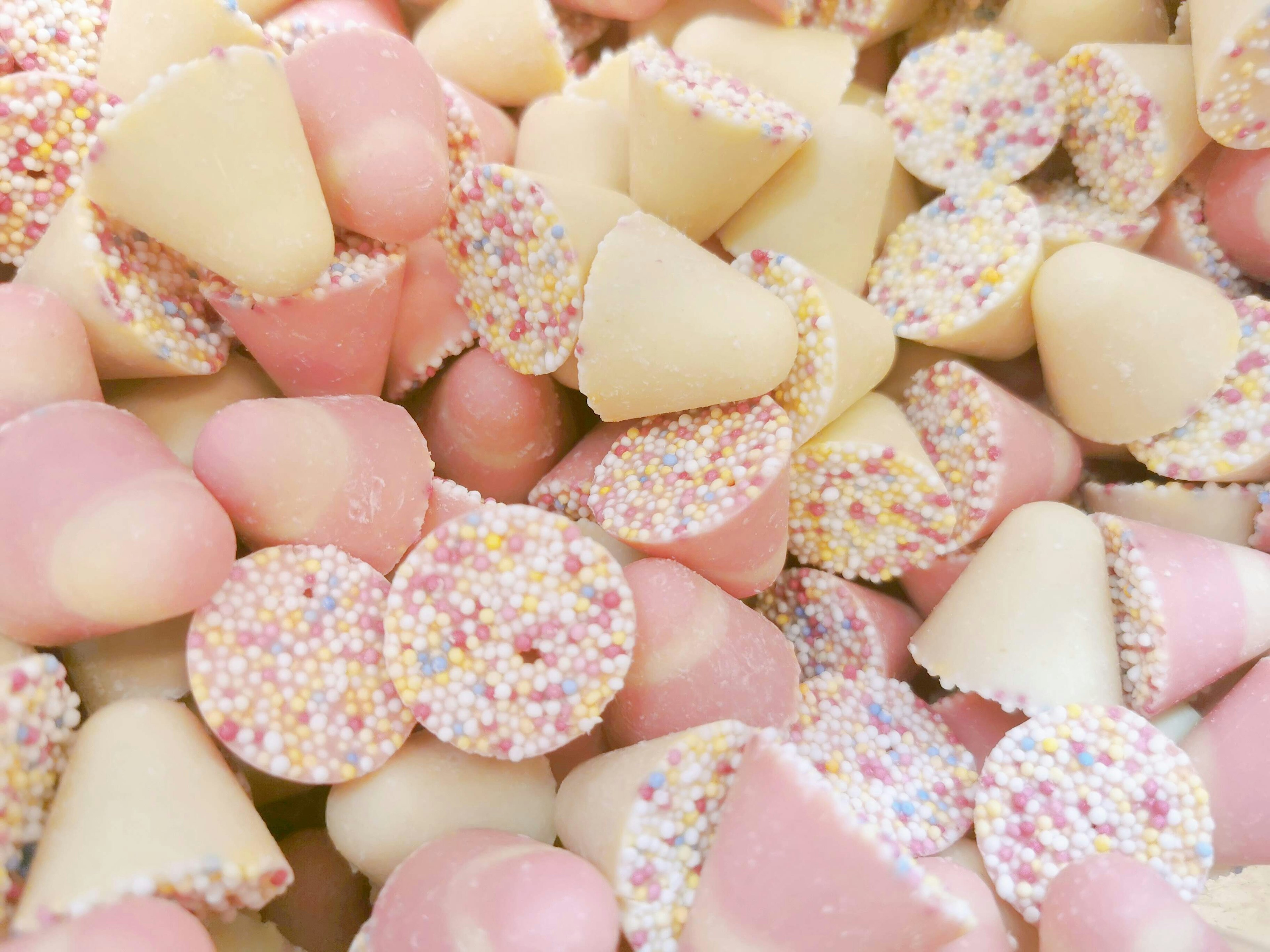 Colorful candies piled together with various shapes