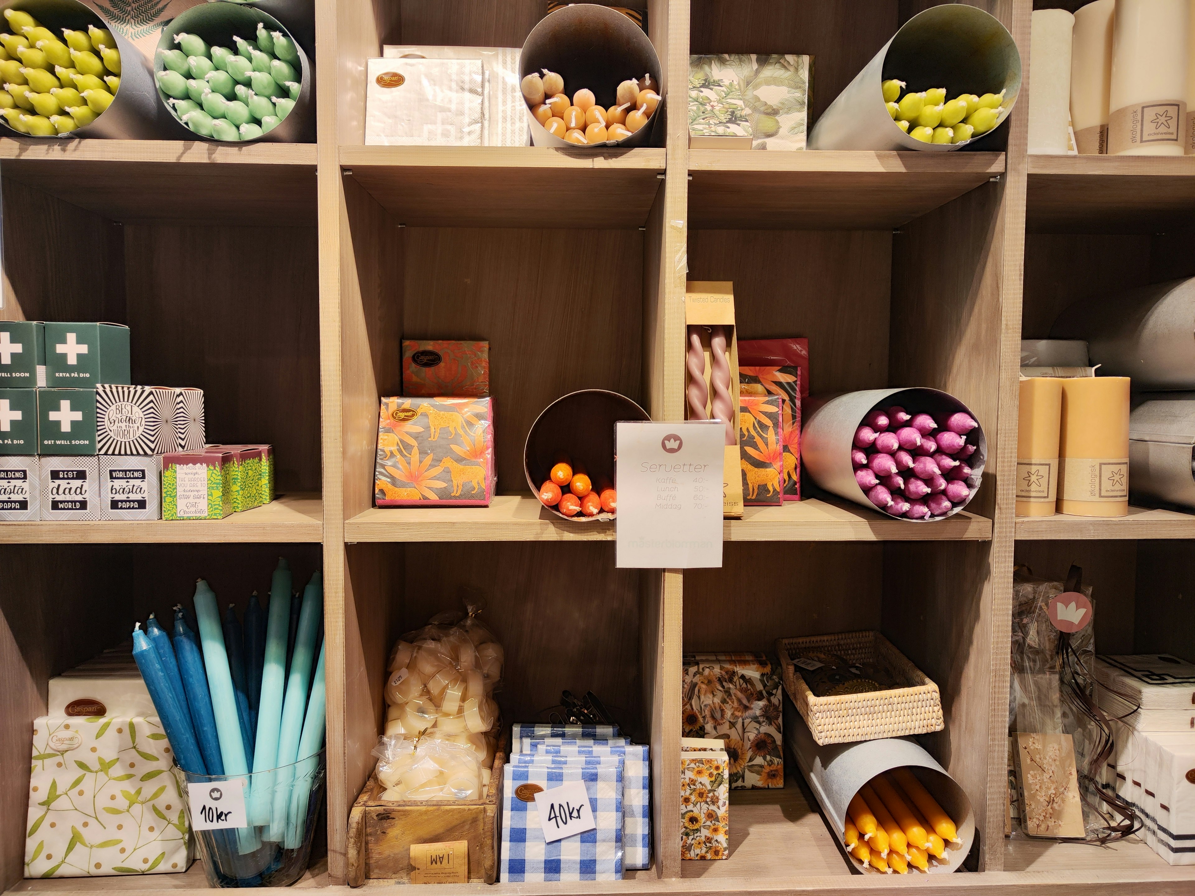 Image of a shelf filled with colorful stationery and items