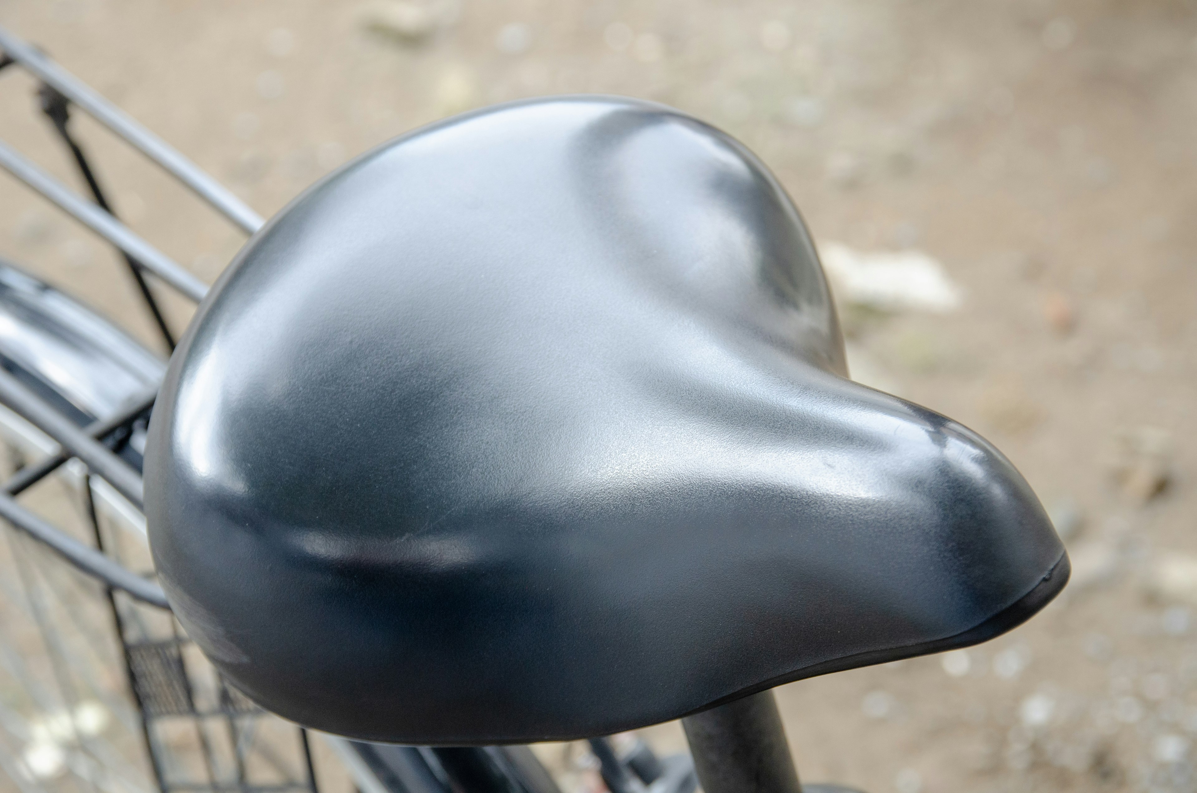 Close-up of a black bicycle saddle