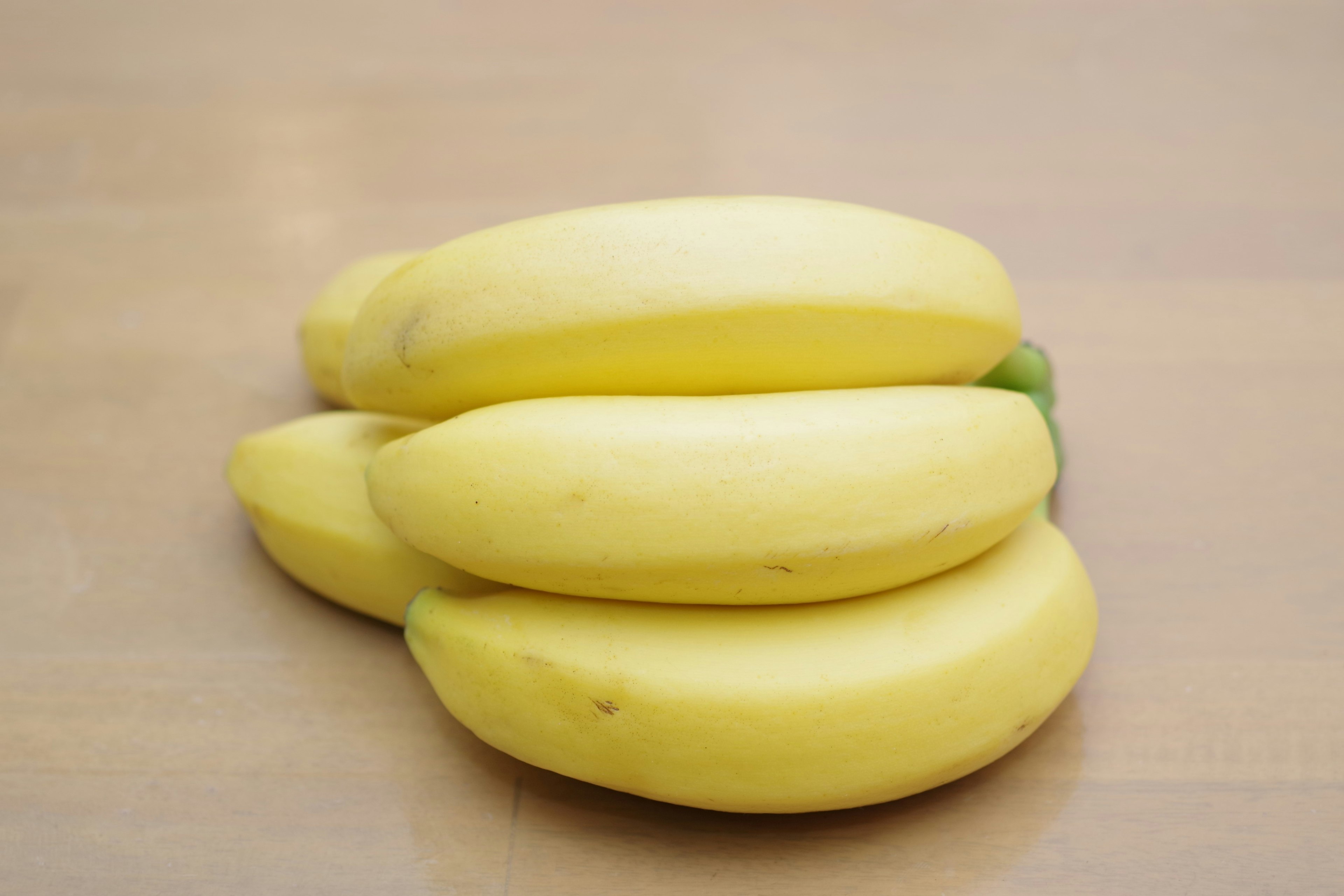 A simple composition of stacked yellow bananas