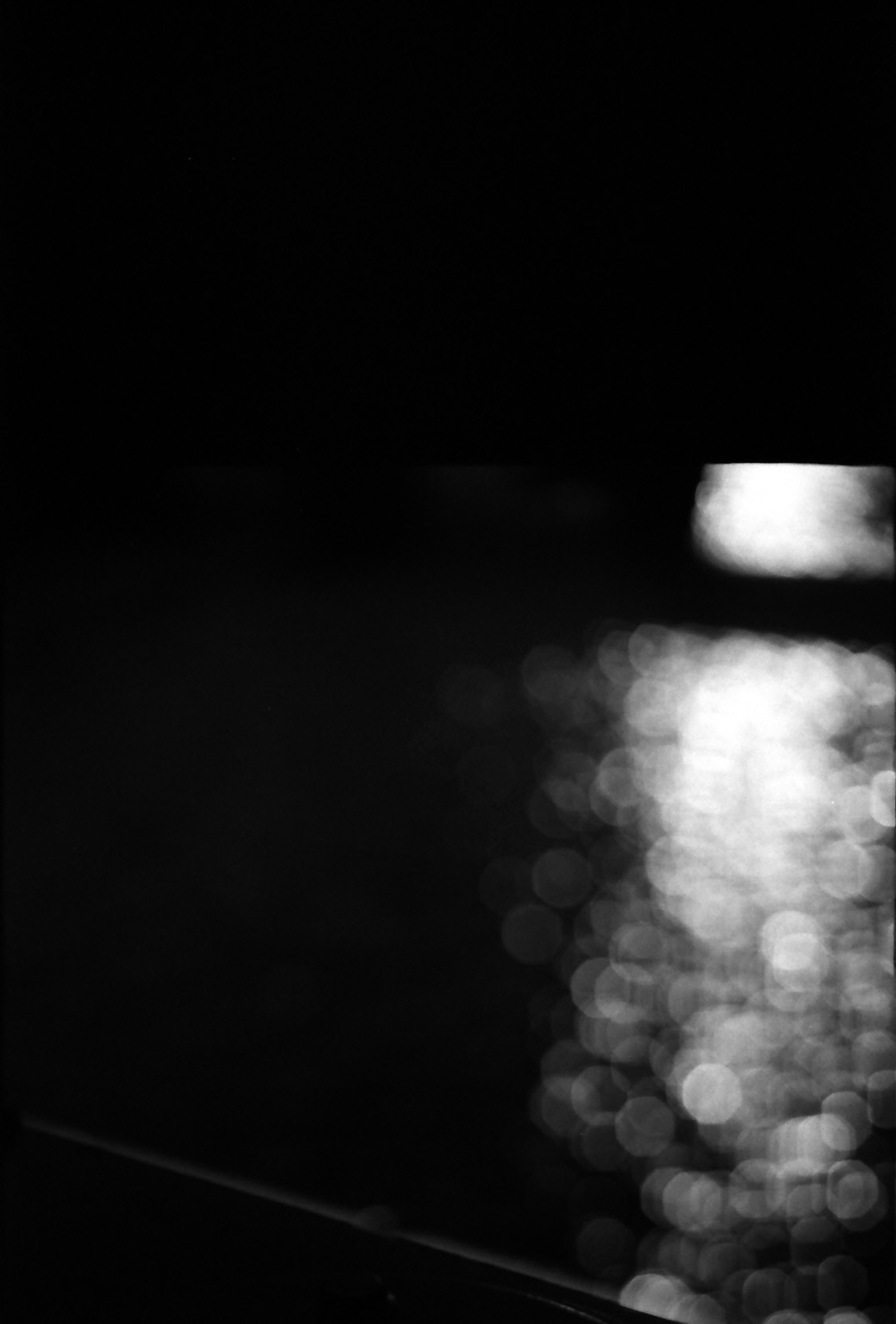 Blurred black and white photo of shimmering water surface