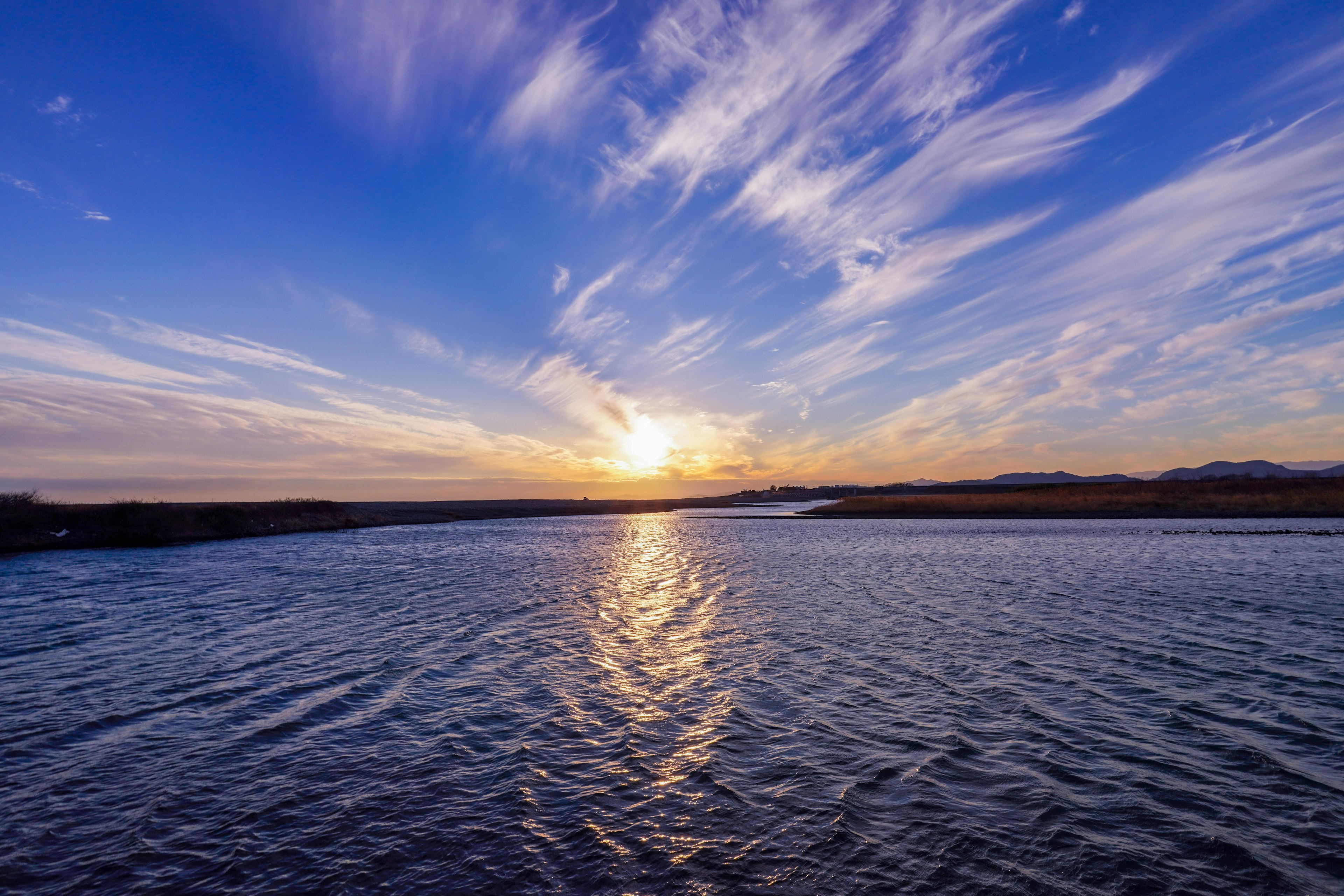 River landscape with blue sky and clouds beautiful sunset reflection