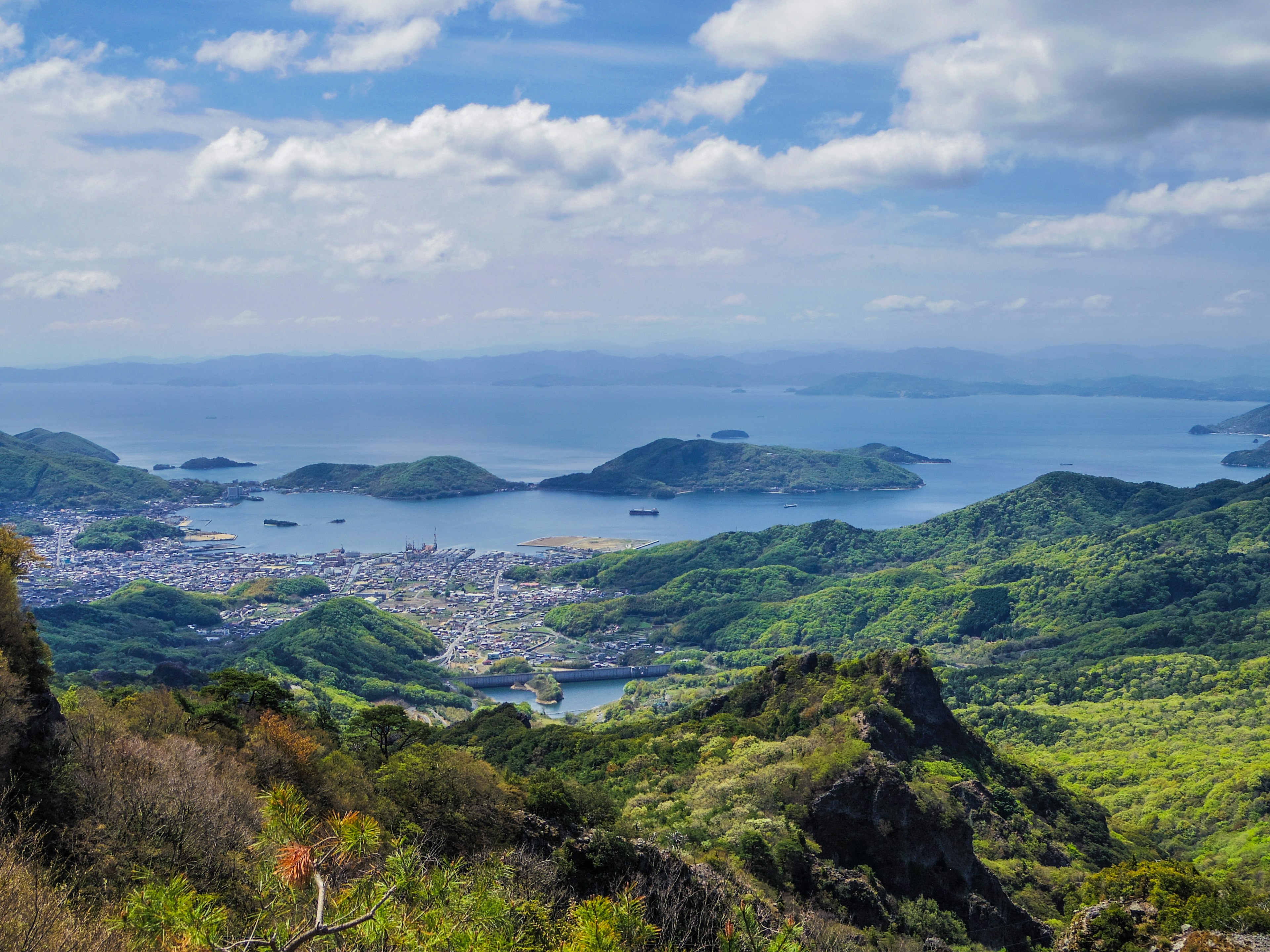 Lush green mountains and a beautiful coastal view