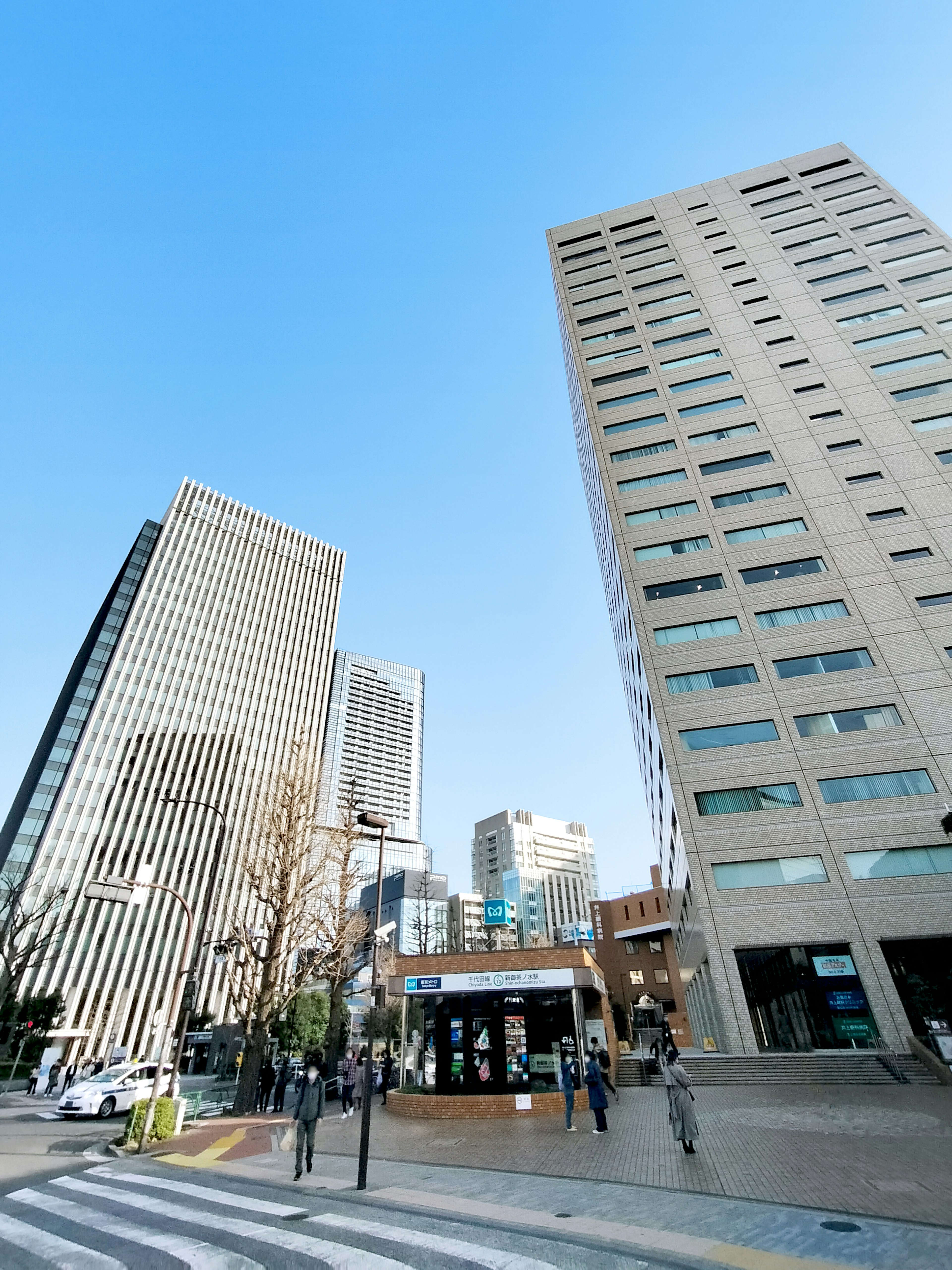 Urban landscape with skyscrapers and clear blue sky