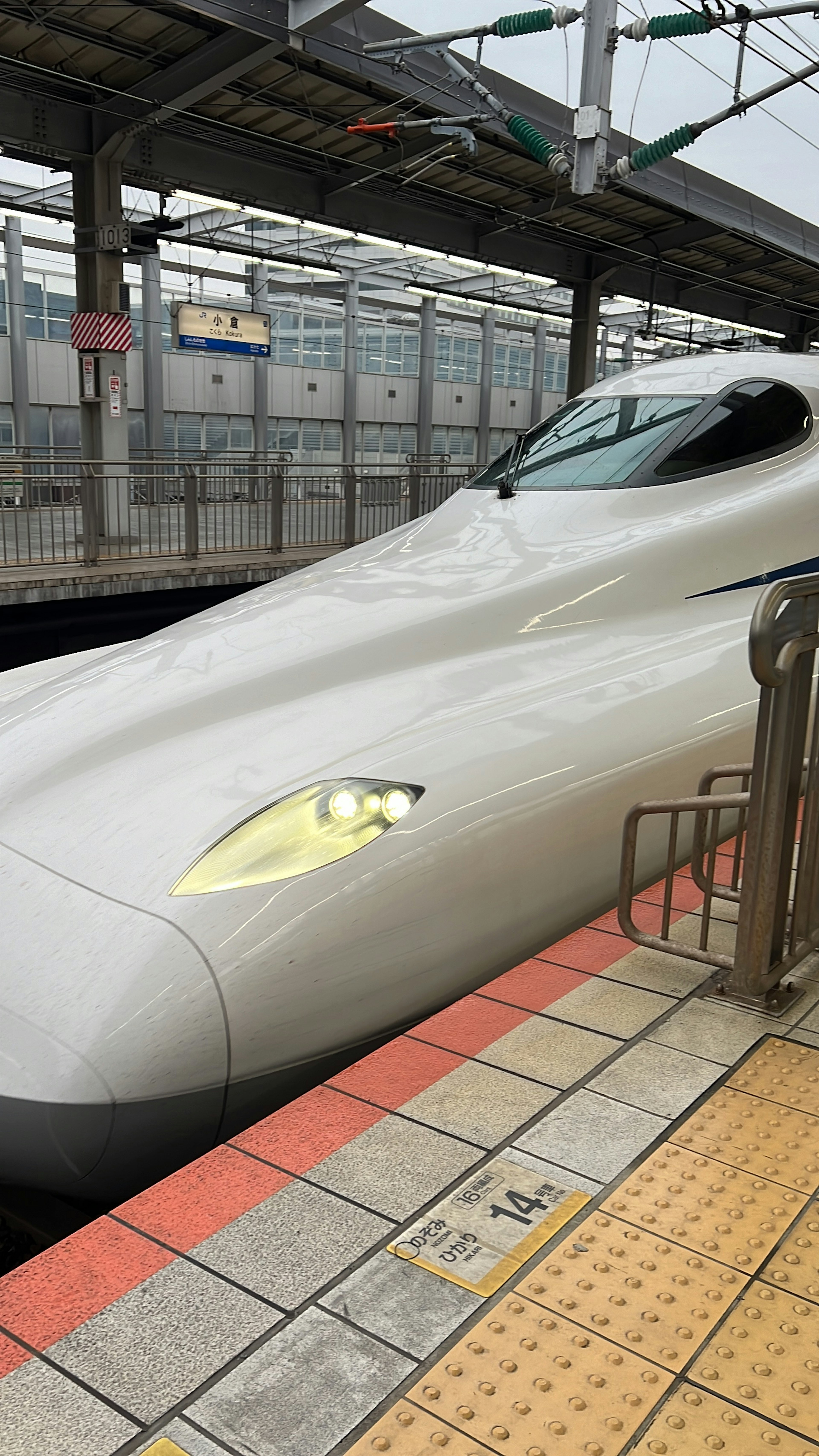 Shinkansen train arriving at a station