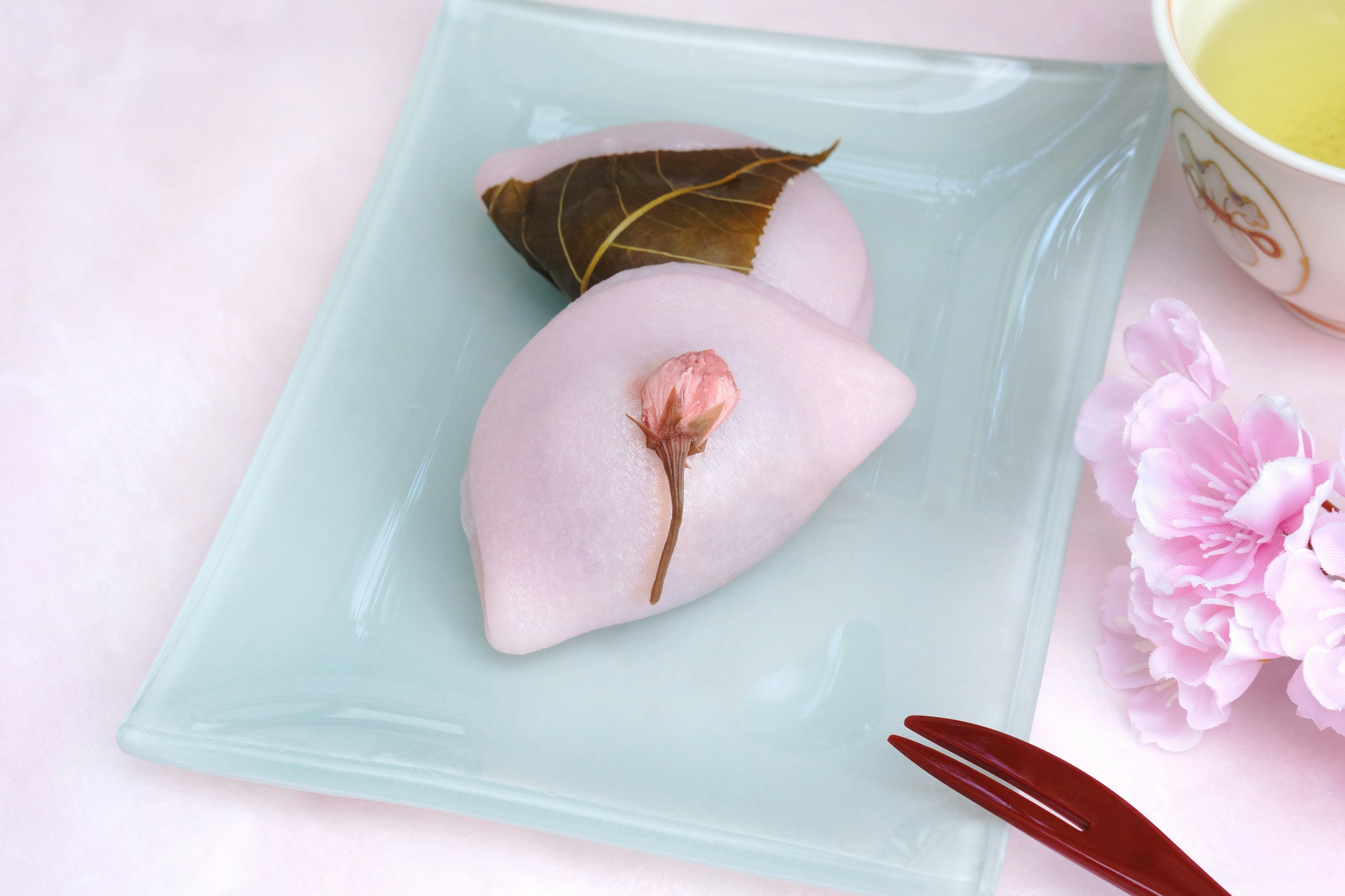 Beautifully presented Japanese sweets topped with cherry blossoms