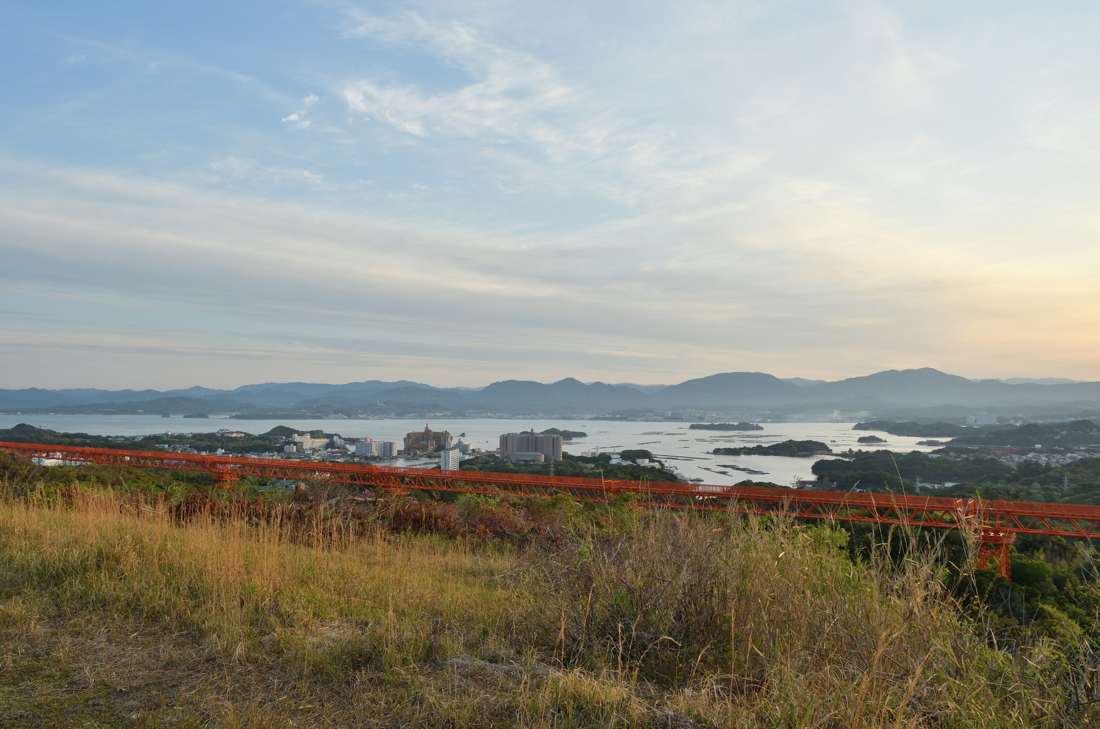 Scenic landscape with blue sky and distant mountains