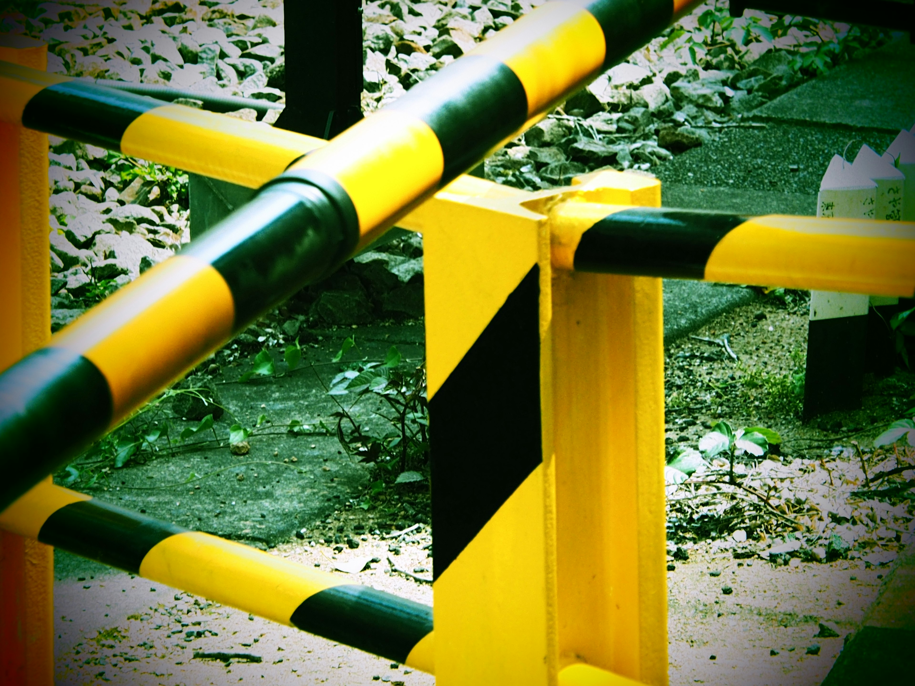 Image showing a section of a yellow and black barricade