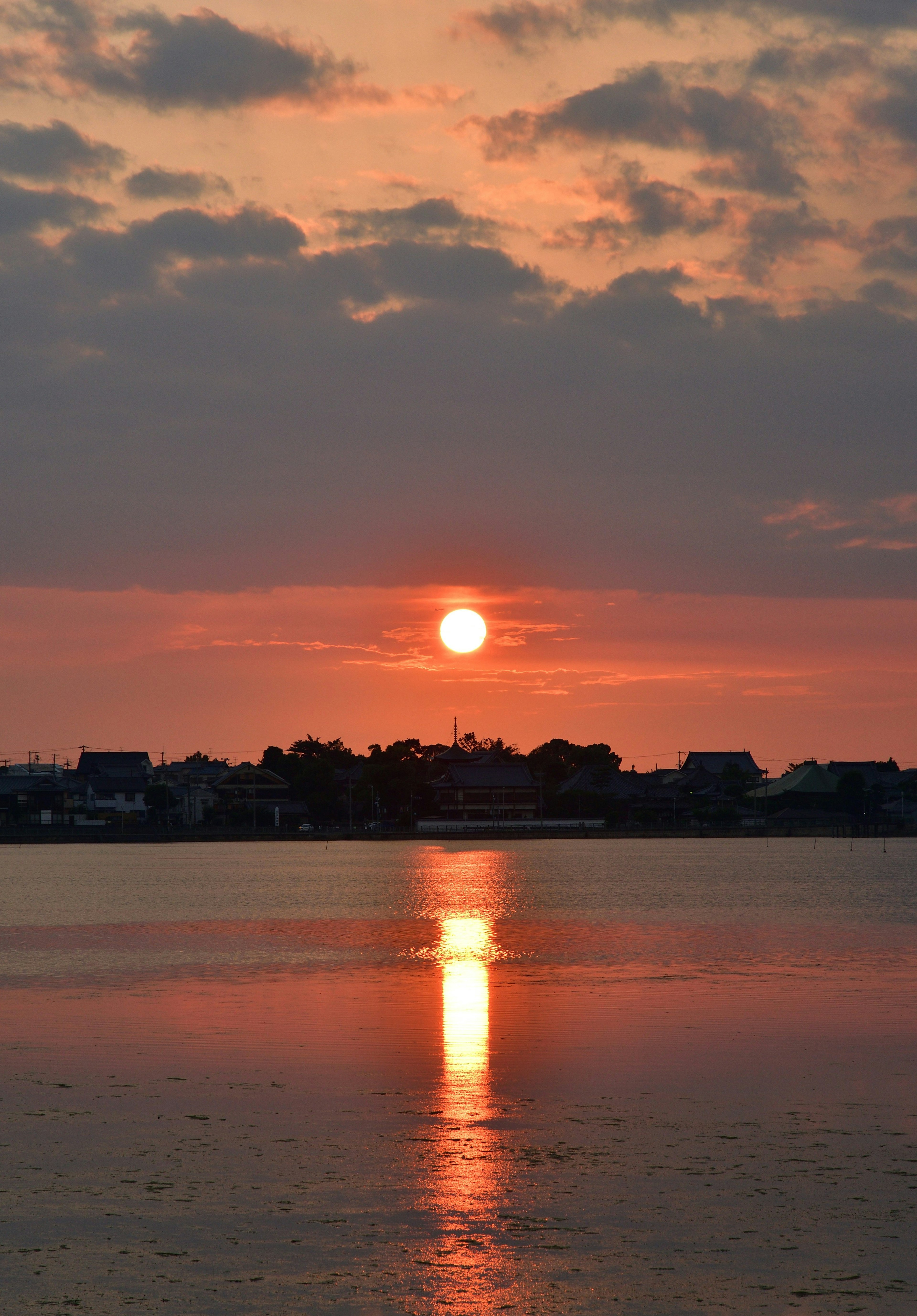 Beautiful landscape with sunset reflecting on the water