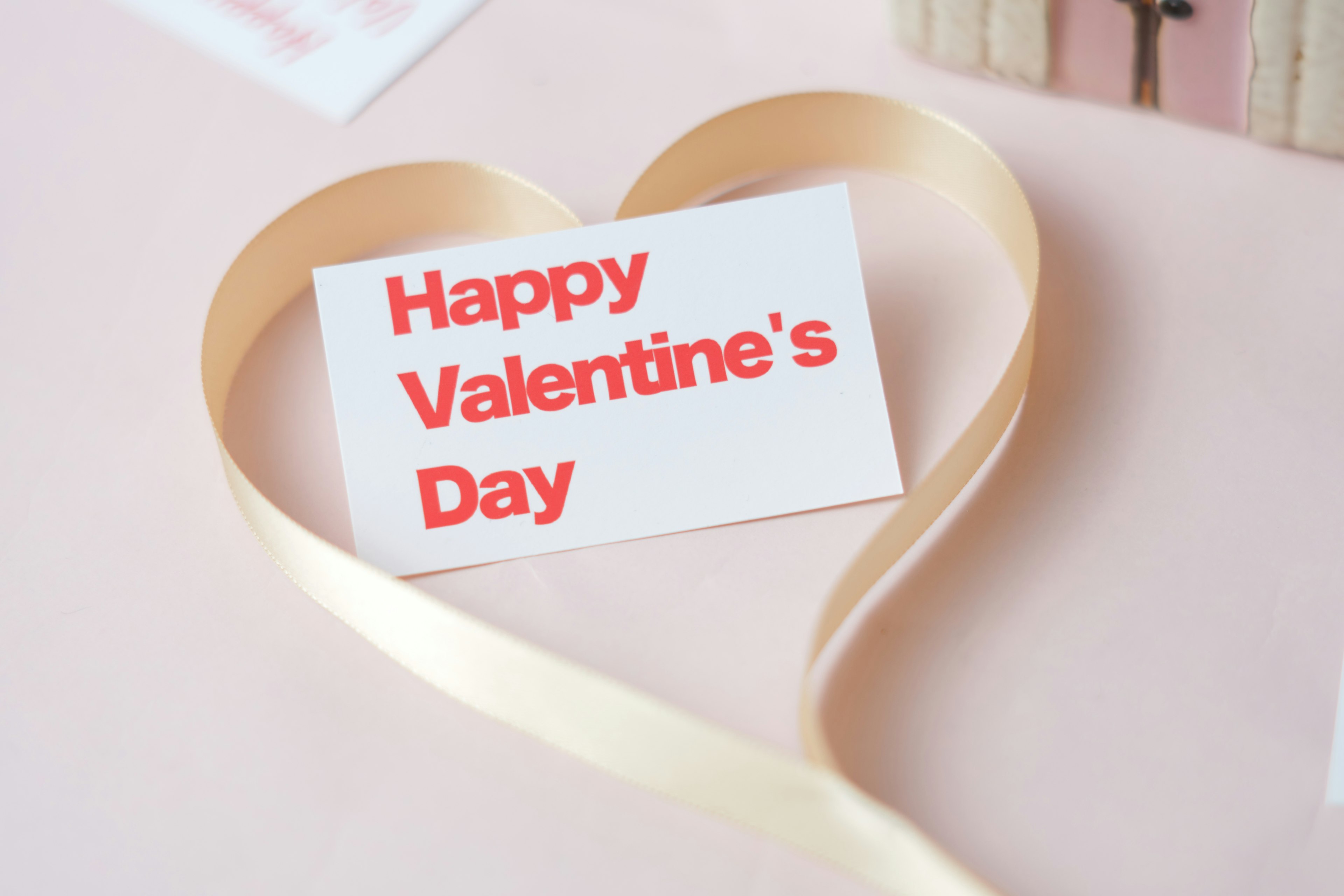 Valentine's Day card with a heart-shaped ribbon