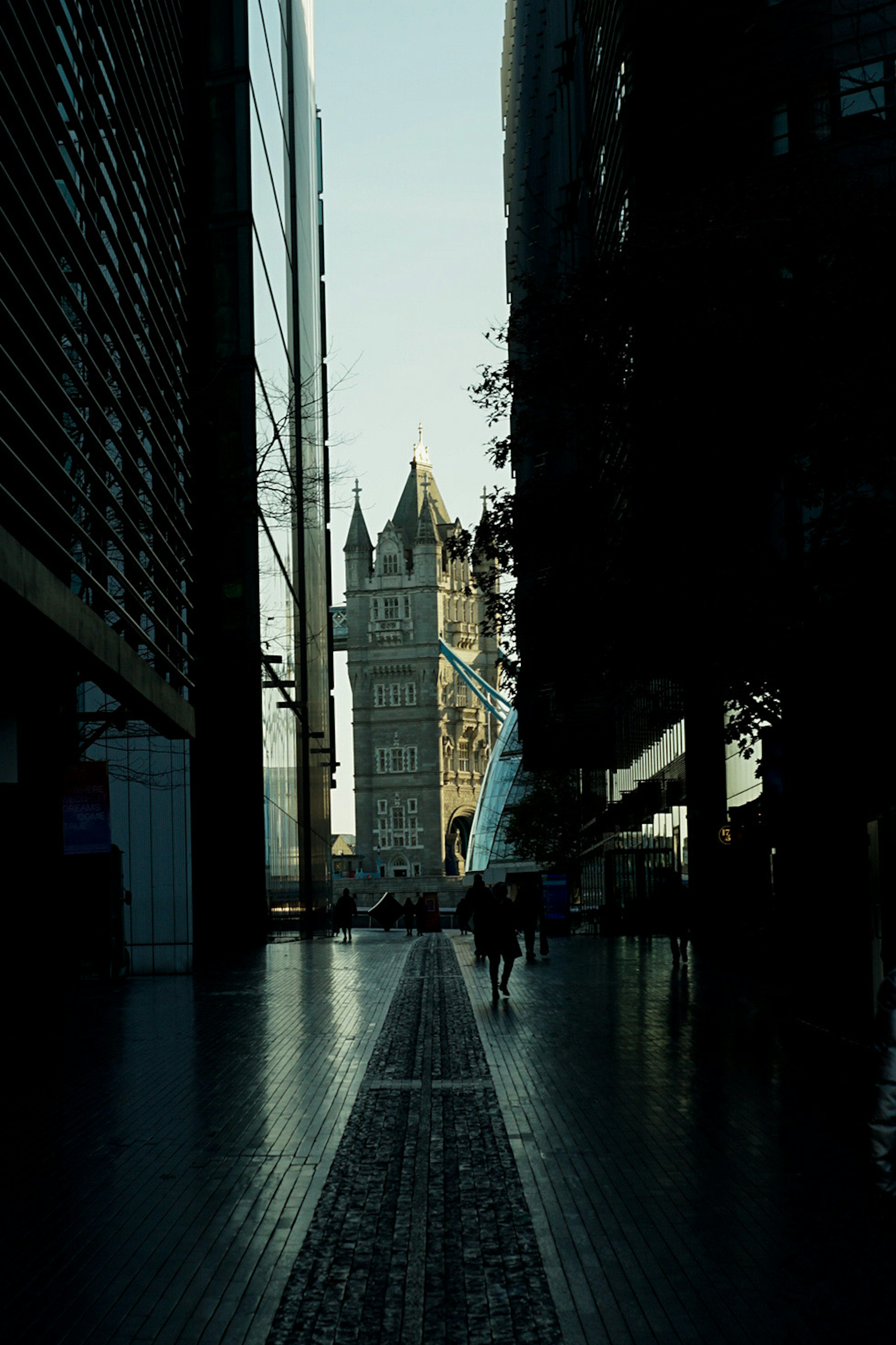 View of Tower Bridge in London framed by modern buildings