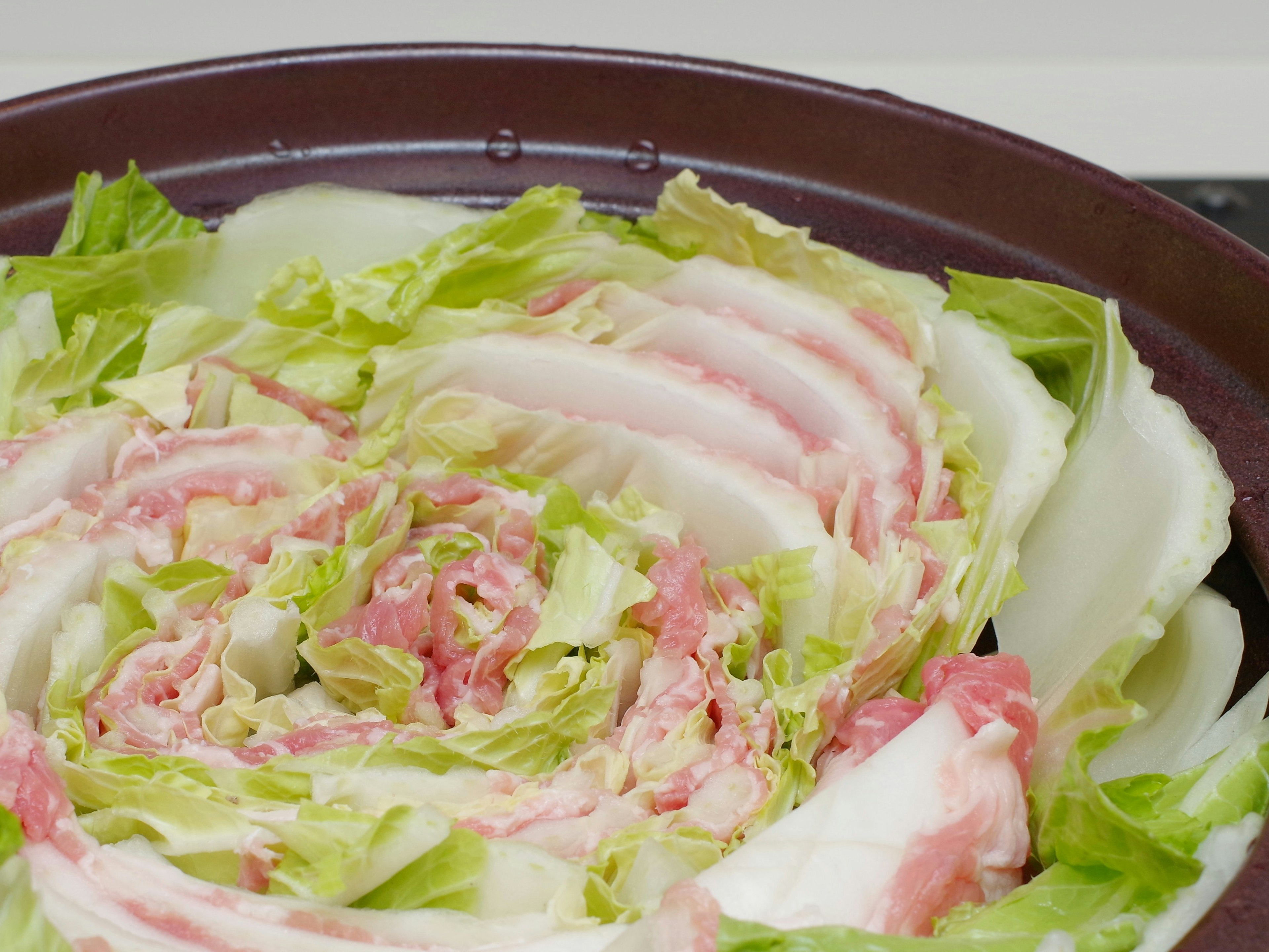 A beautiful spiral arrangement of pork and lettuce