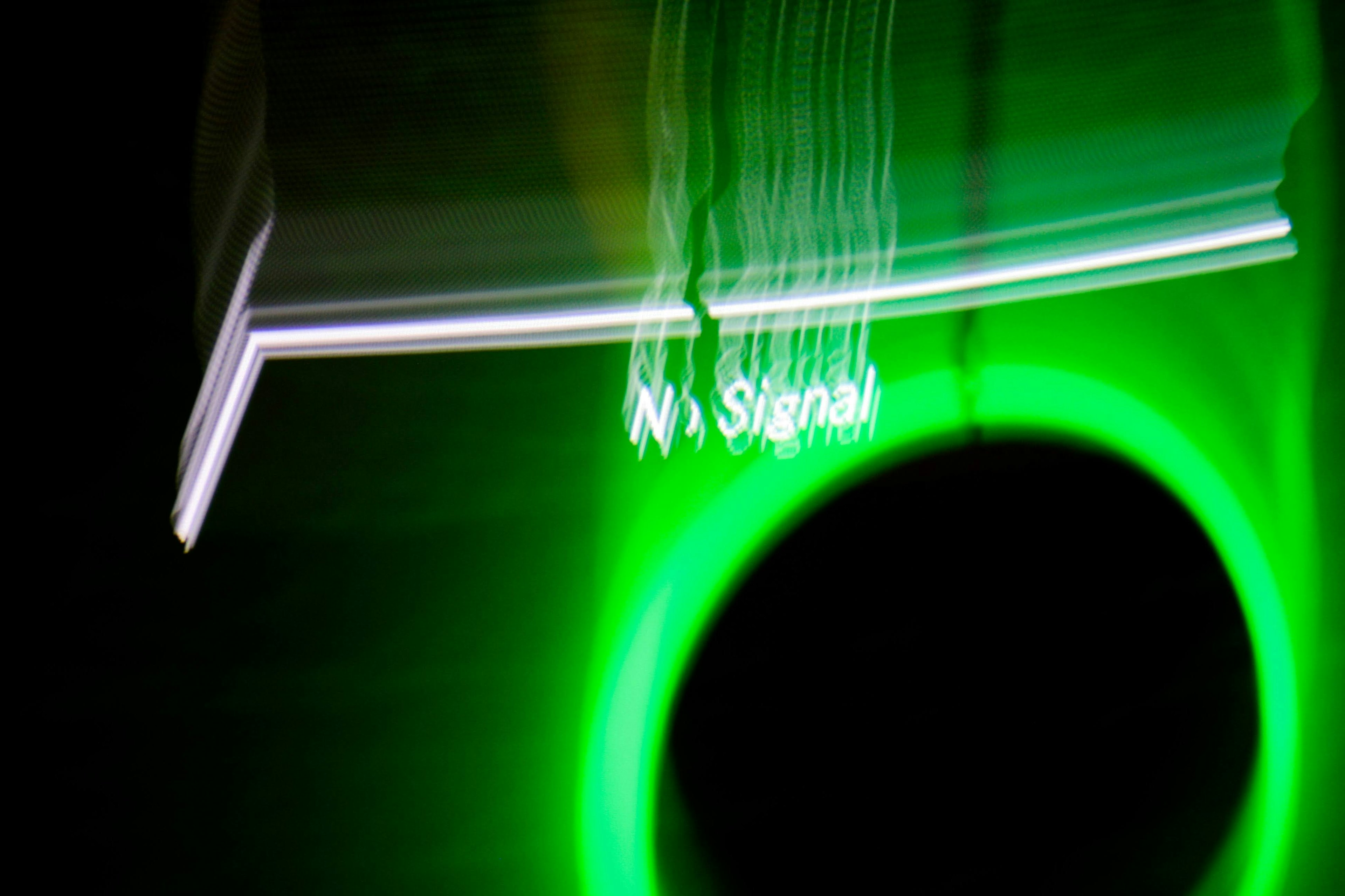 Lumière verte avec un cercle noir indiquant aucun signal