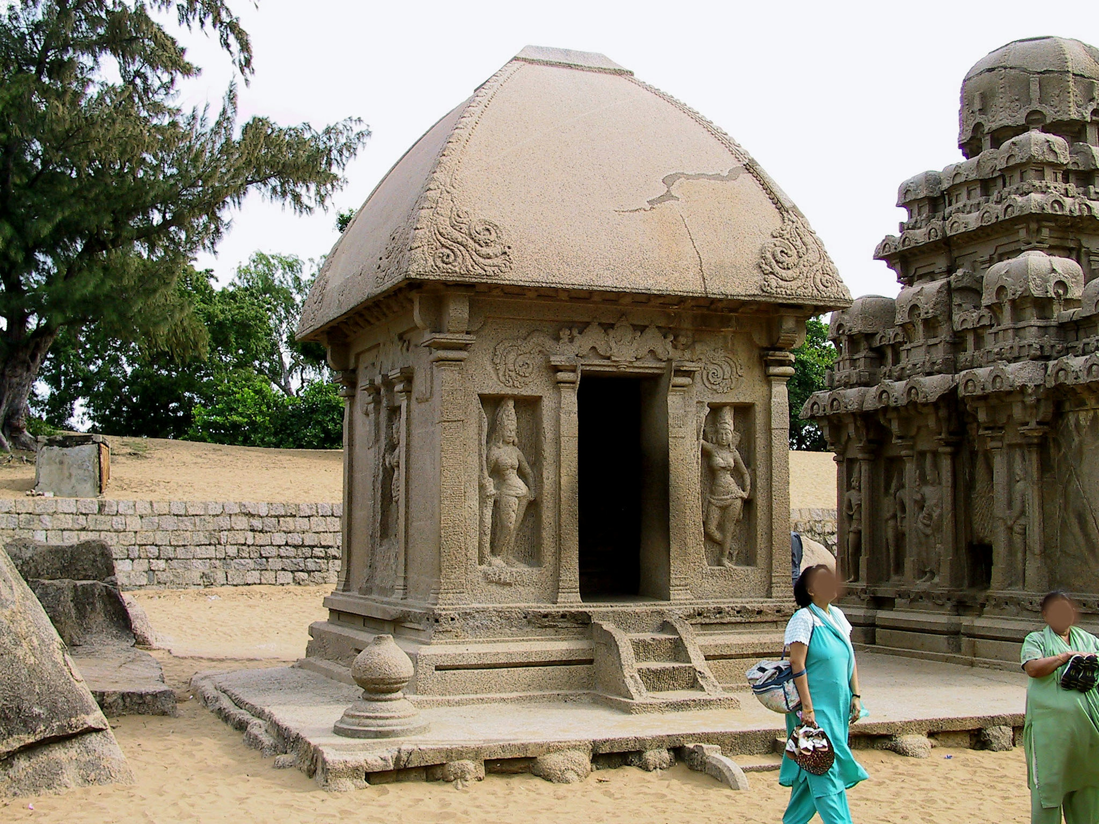 Ancient stone temple with intricate carvings and unique dome structure