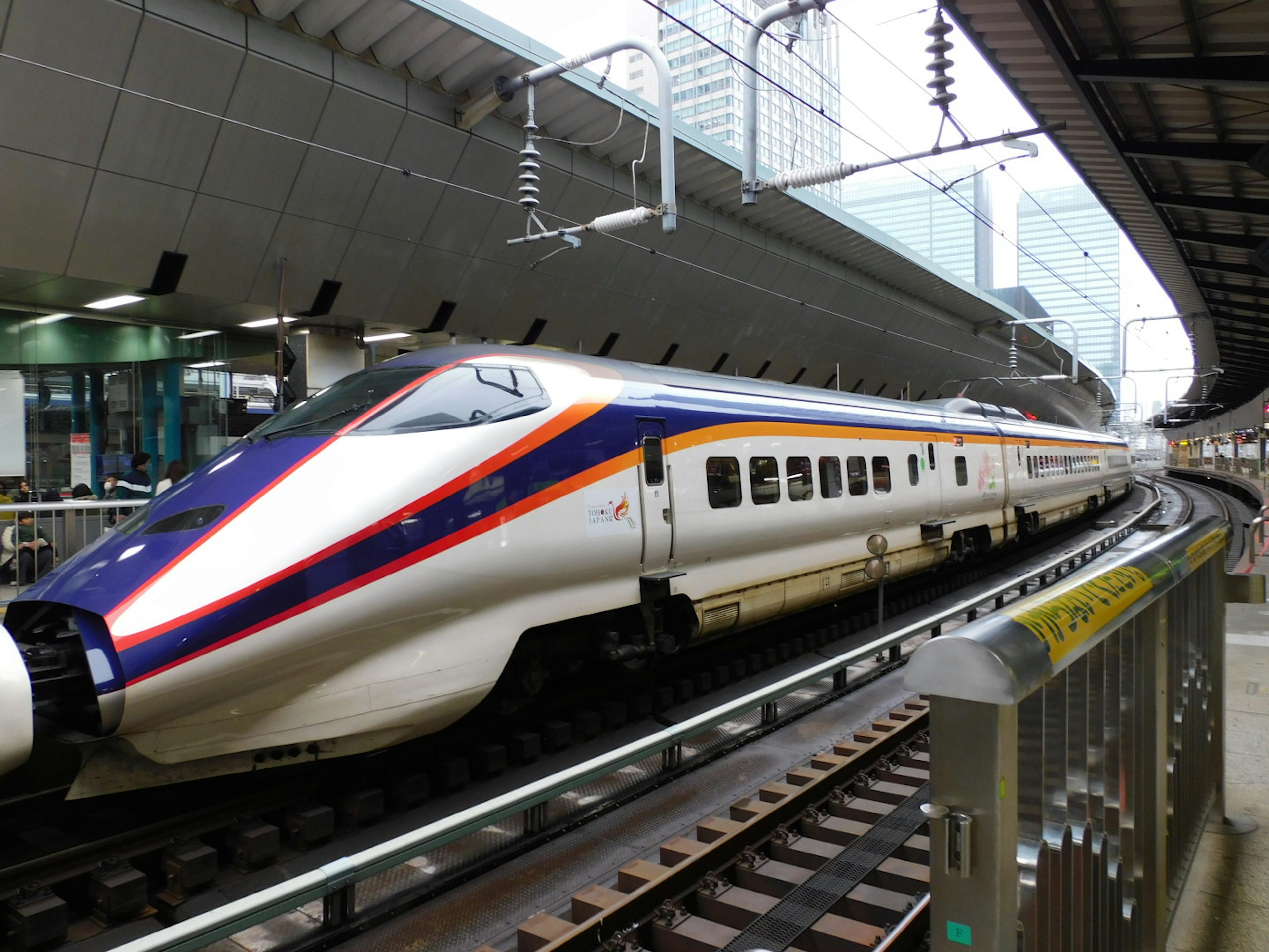 Shinkansen train at a station showcasing its modern design