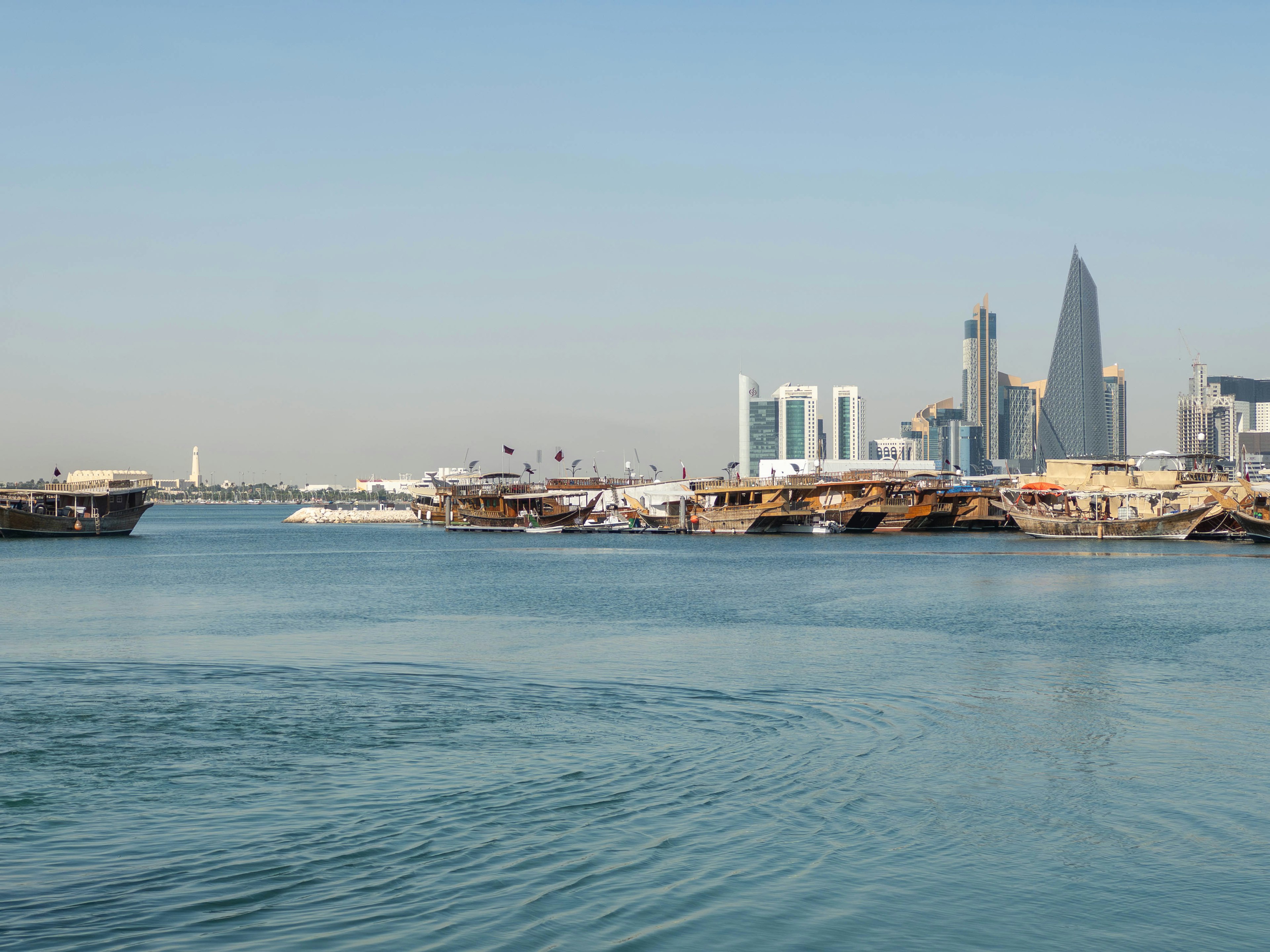 Urban landscape featuring water and modern buildings