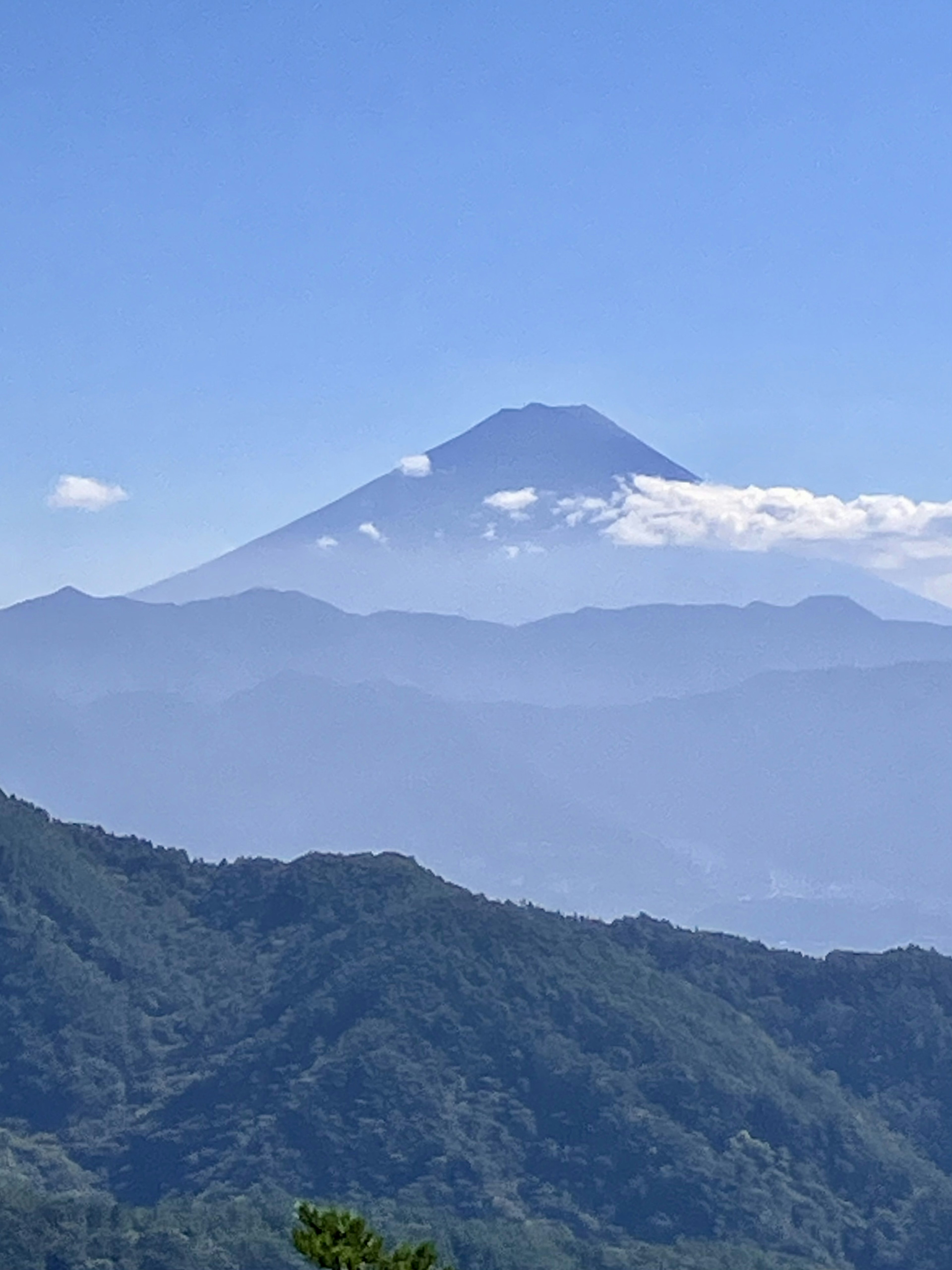 Scenic view of Mount Fuji under a clear blue sky