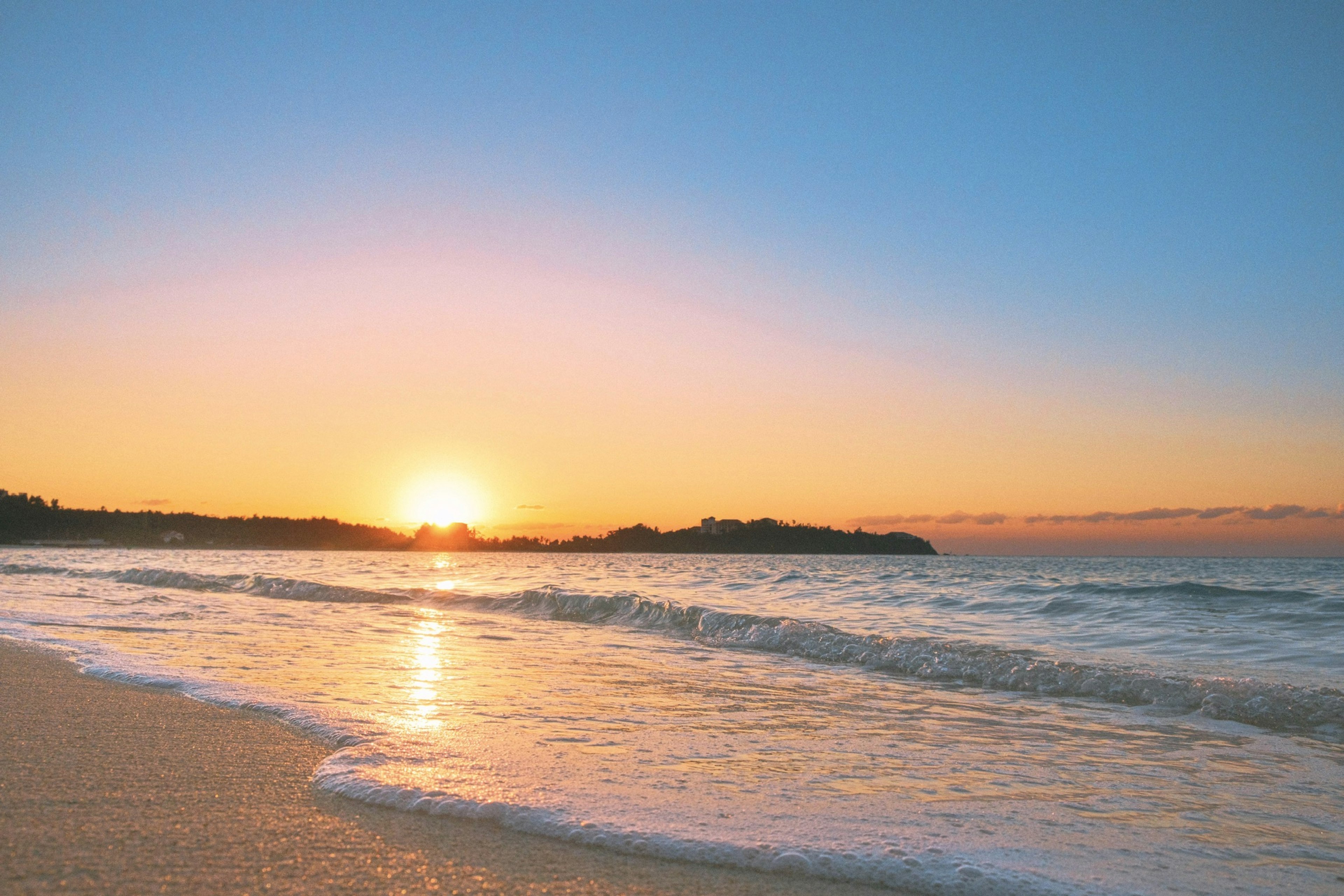 Beautiful sunset over the ocean with gentle waves