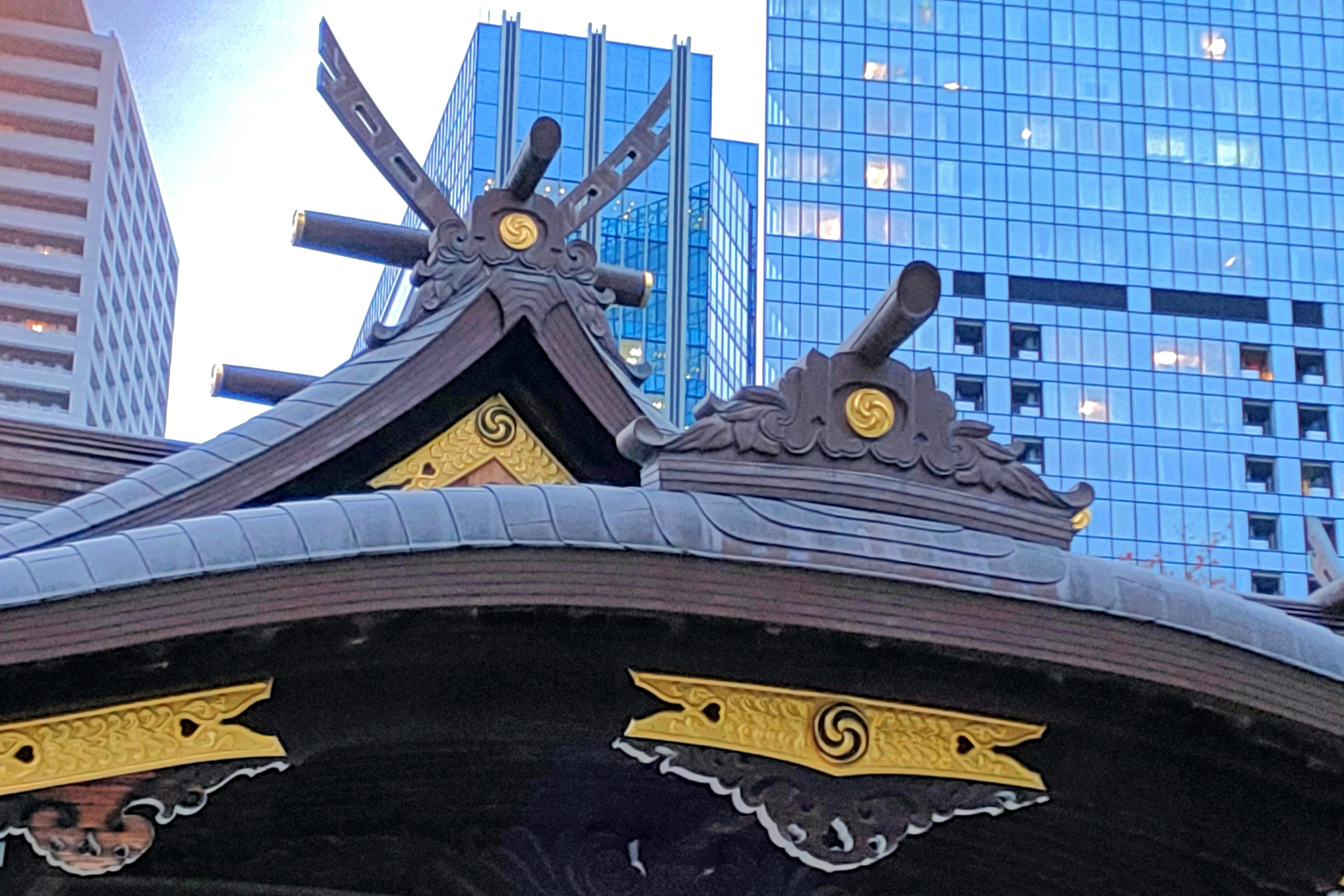 Traditional building roof decorations among skyscrapers