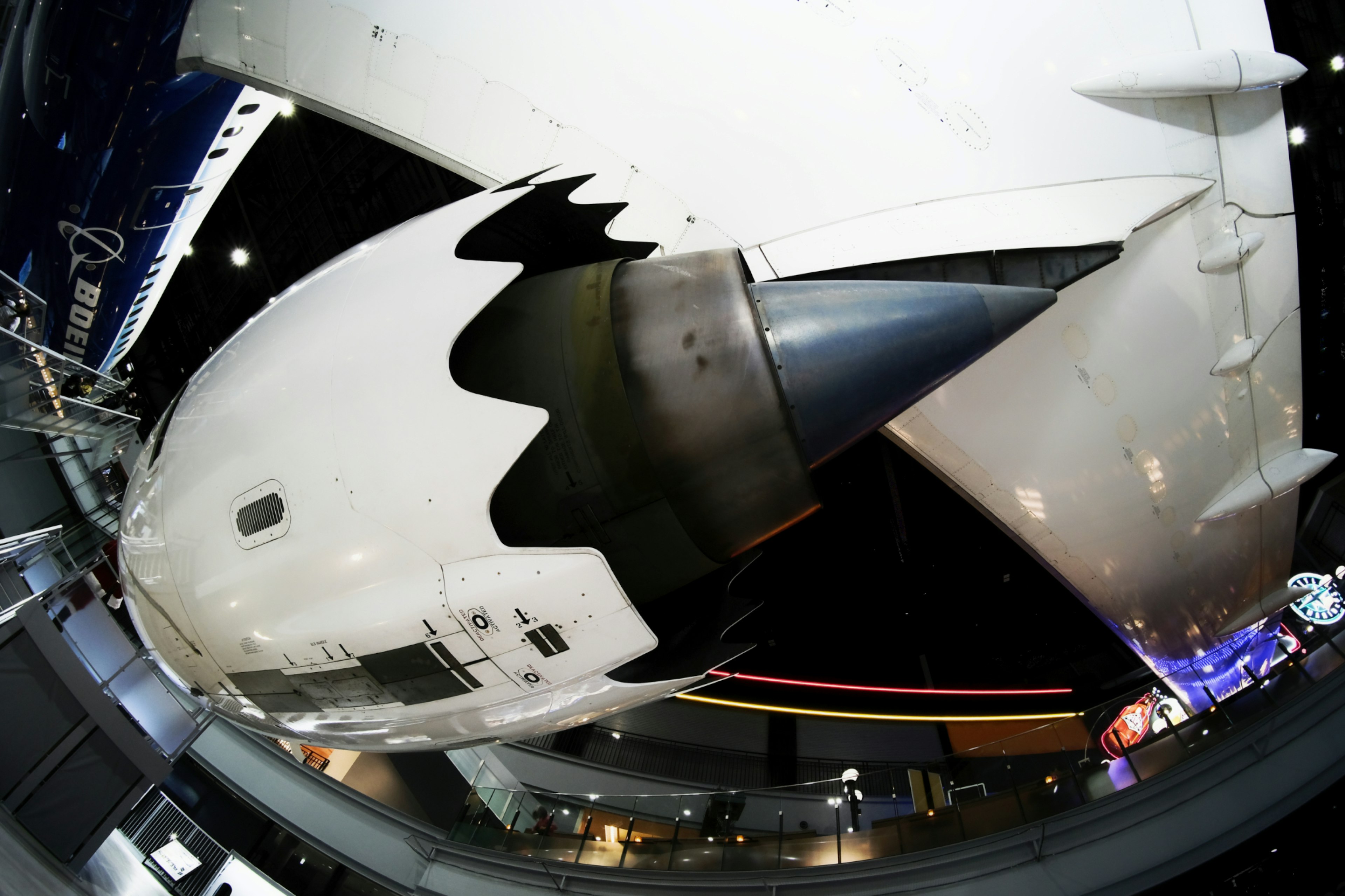 Close-up of an aircraft engine featuring a white and black design showcasing aviation technology